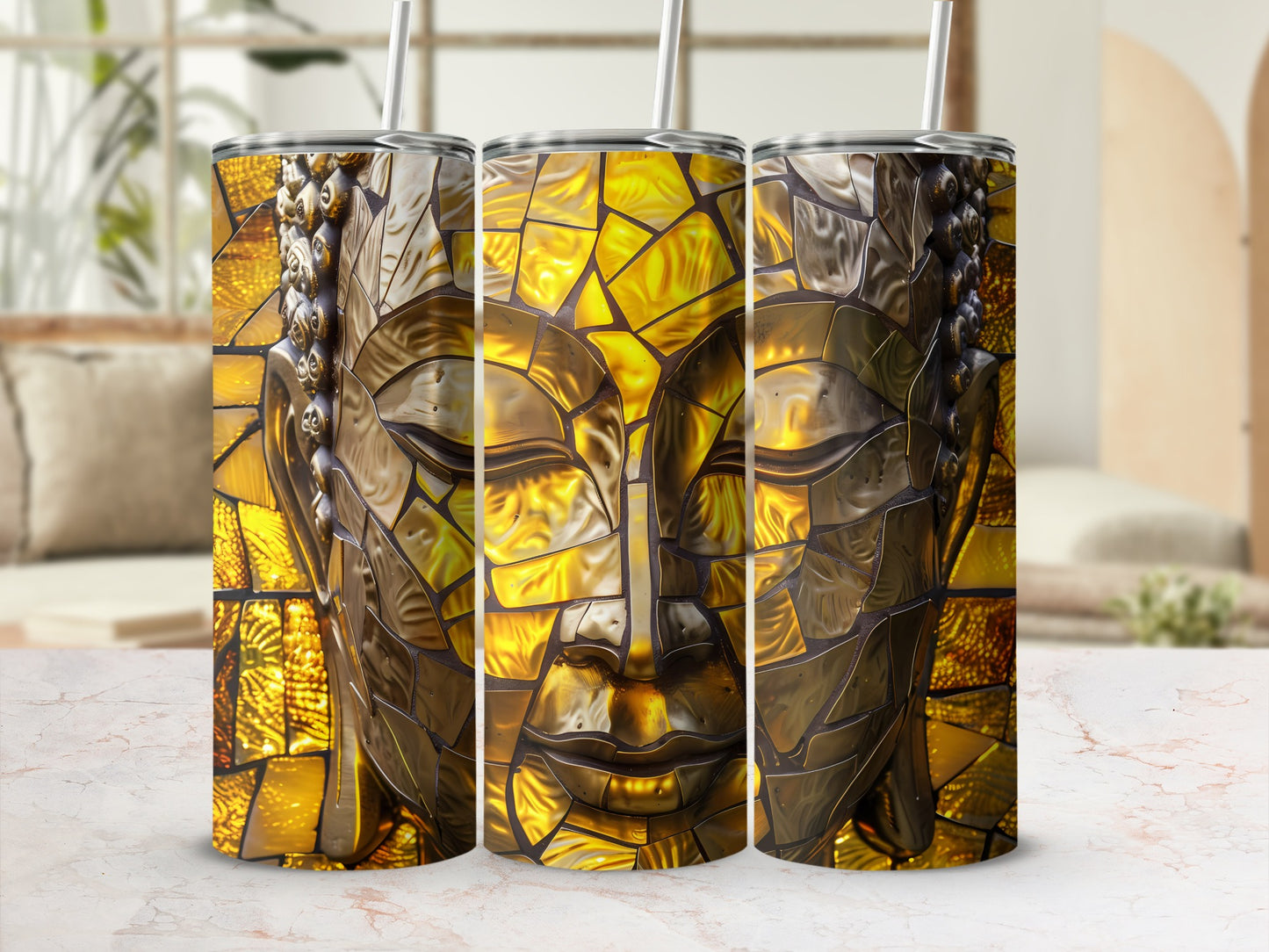 Three metallic Buddha head tumblers with straws, detailed mosaic design.