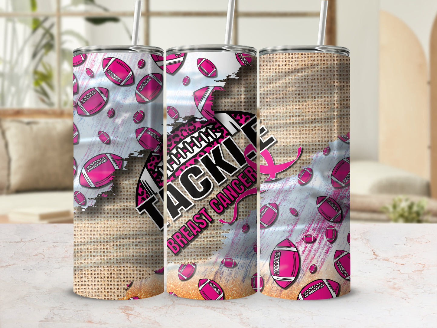 Pink football pattern tumbler with "Tackle Breast Cancer" text.