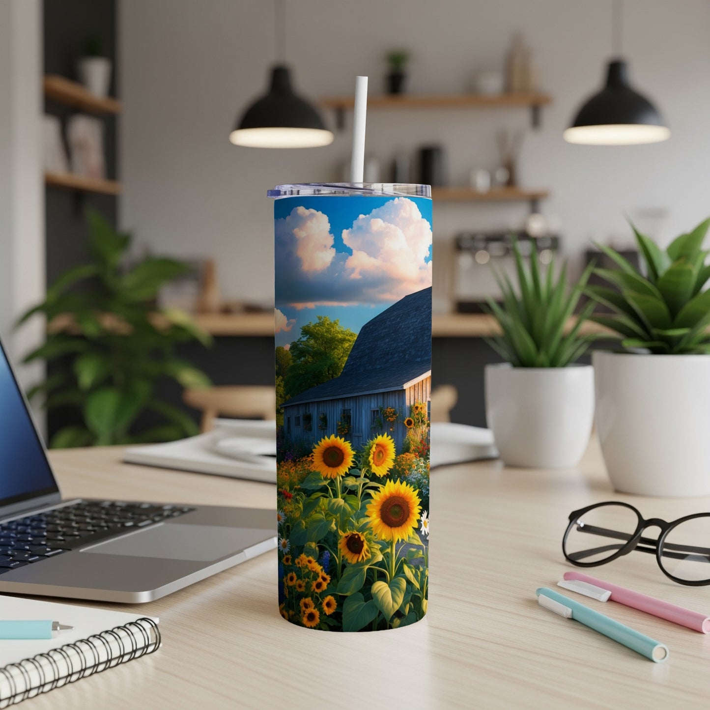 Tall tumbler with sunflowers and barn scene design.