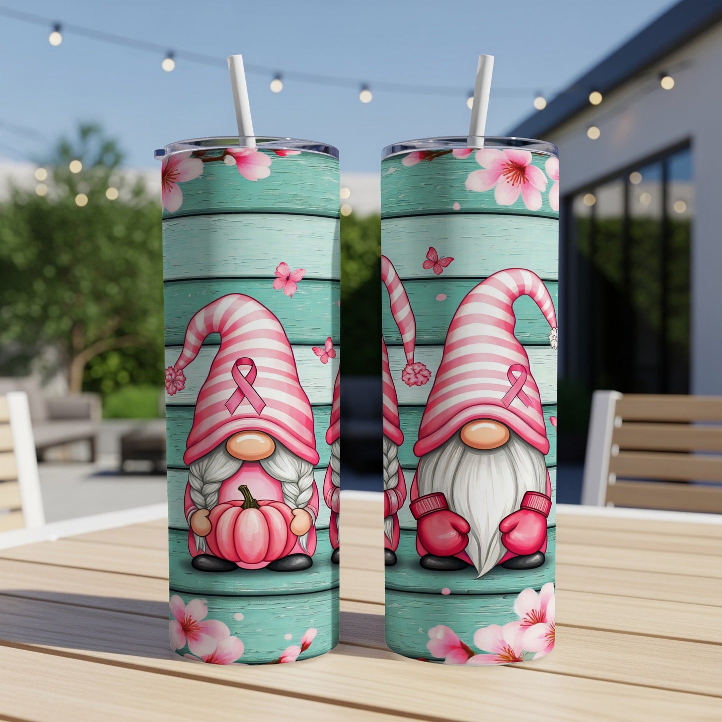 Two pink ribbon gnomes with pumpkins and cherry blossoms.