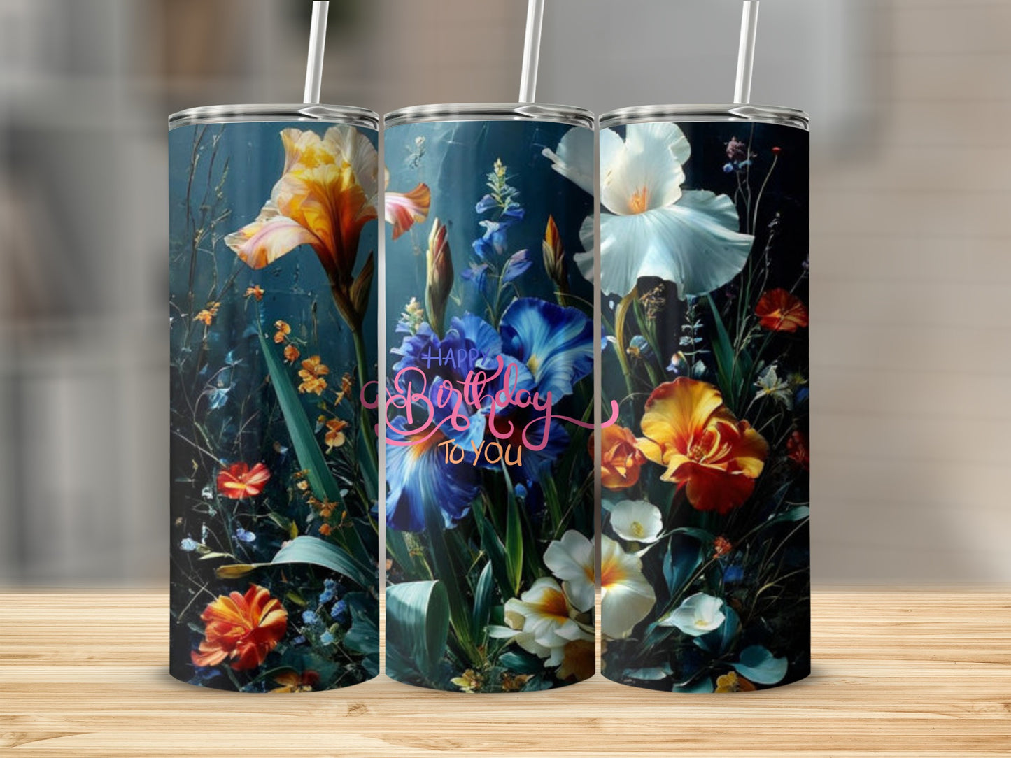 Floral tumbler with "Happy Birthday to you" text on a wooden surface.