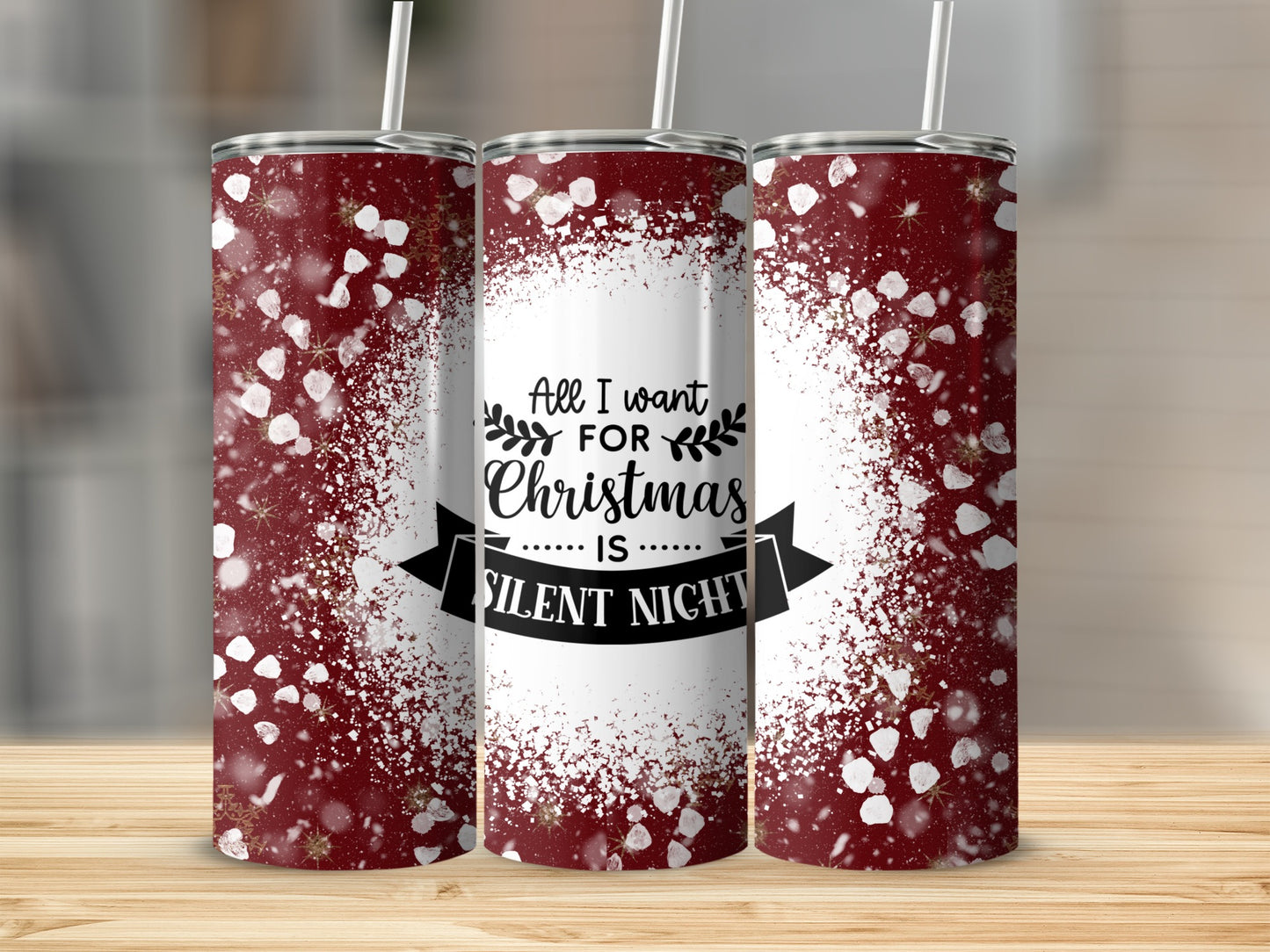 Three maroon tumblers with white snowflake spray and "All I want for Christmas is Silent Night" text.