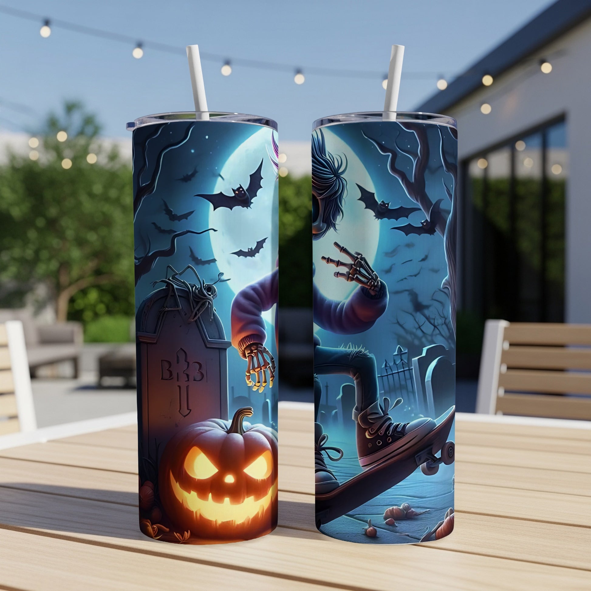 Halloween themed tumblers with a spooky graveyard scene and skateboarding skeleton.