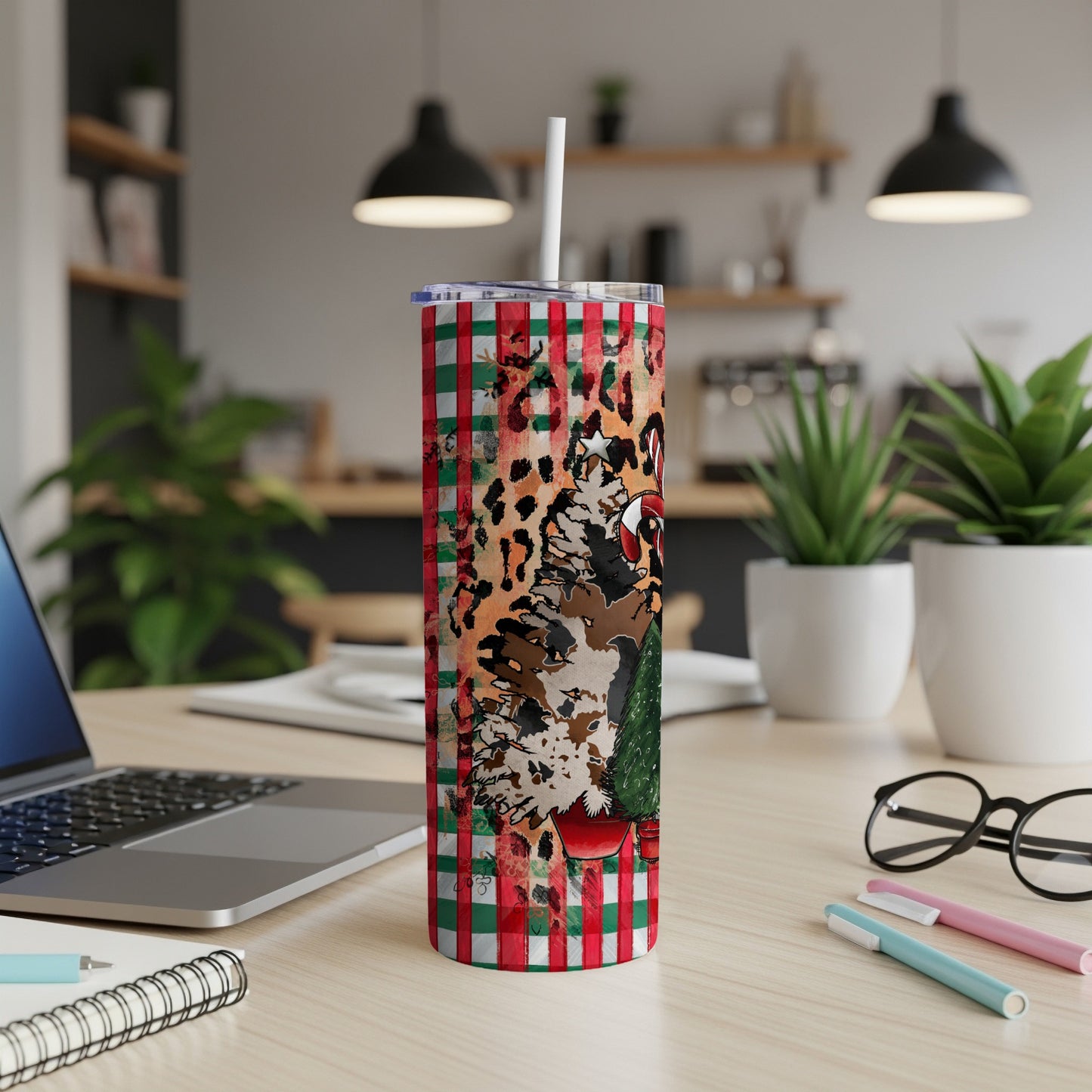 Red plaid tumbler with leopard print and Christmas tree design.