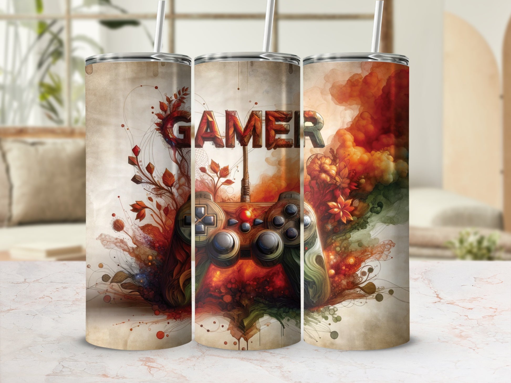 Video game controller with "GAMER" text and floral accents on three tumblers.