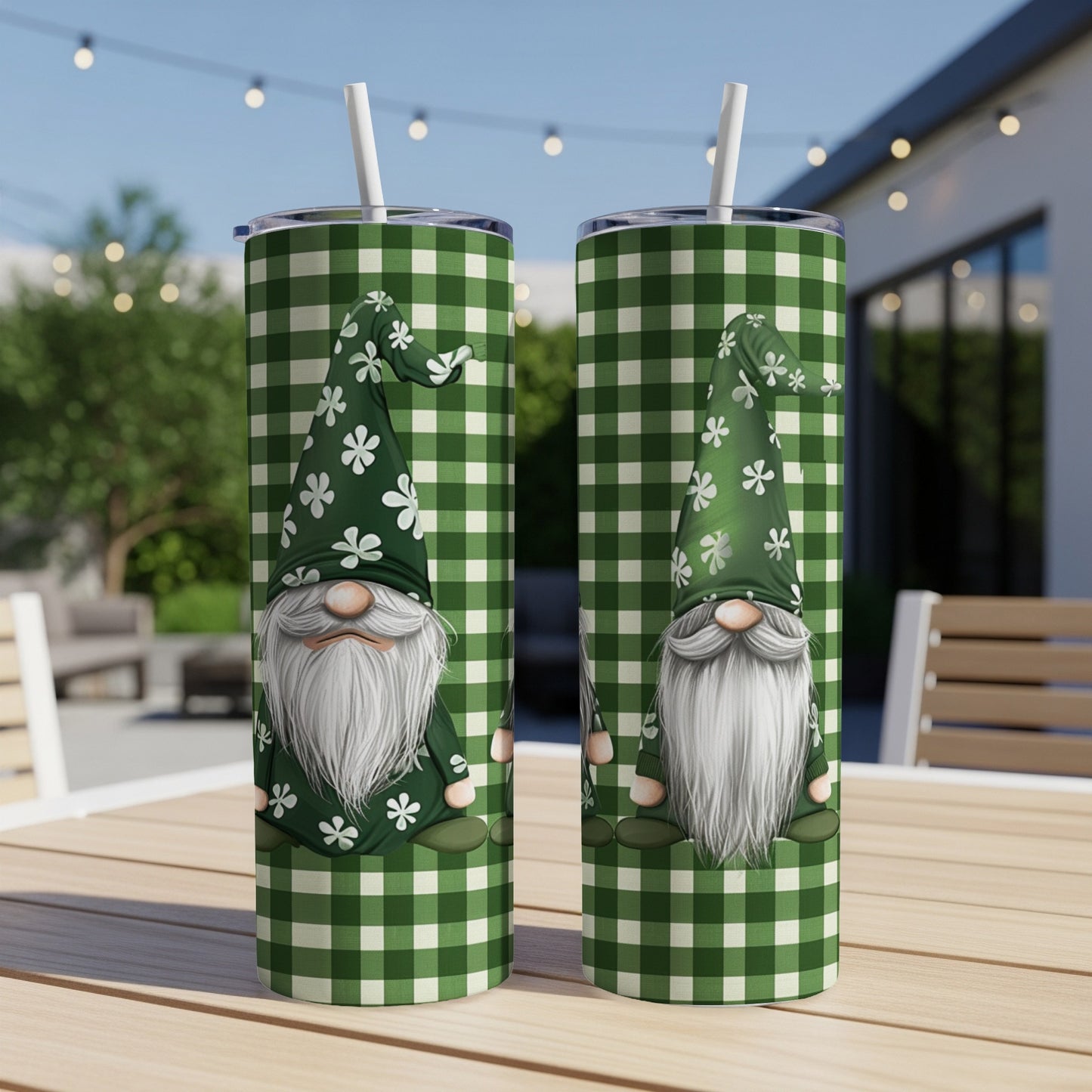Two tumblers with green gingham pattern and gnome illustrations.