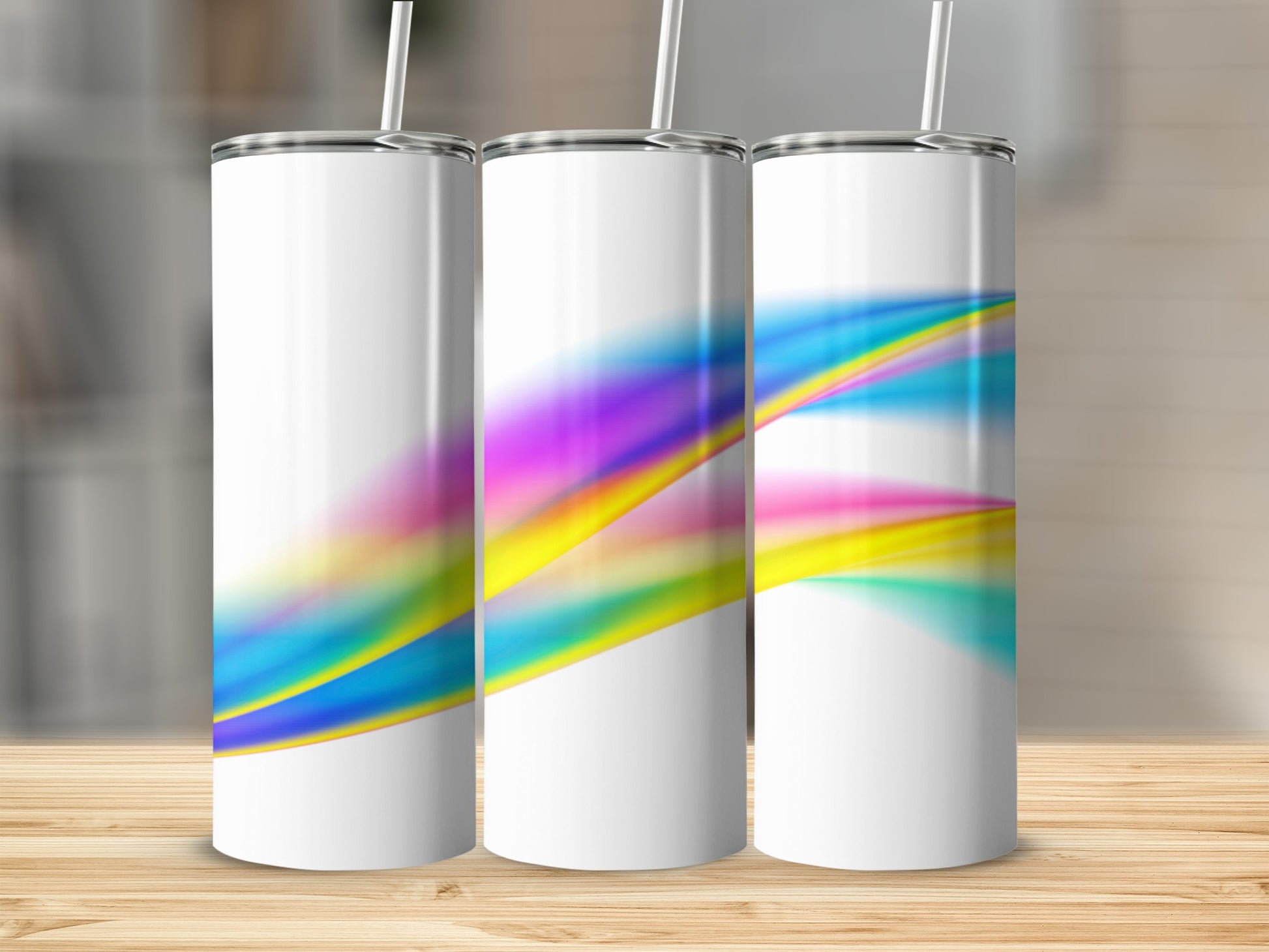 Three blank white tumblers with colorful abstract wave design.