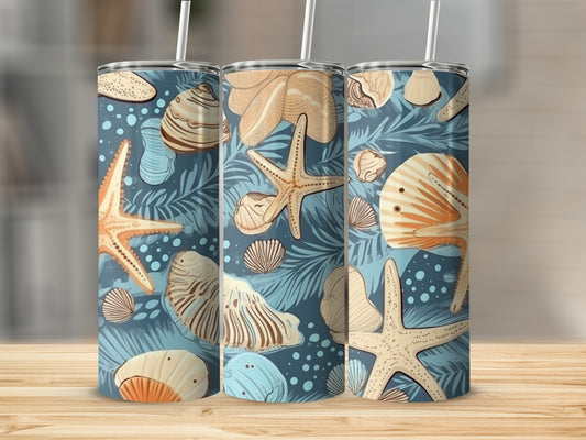 Three tumblers with a seashell and palm leaf pattern.