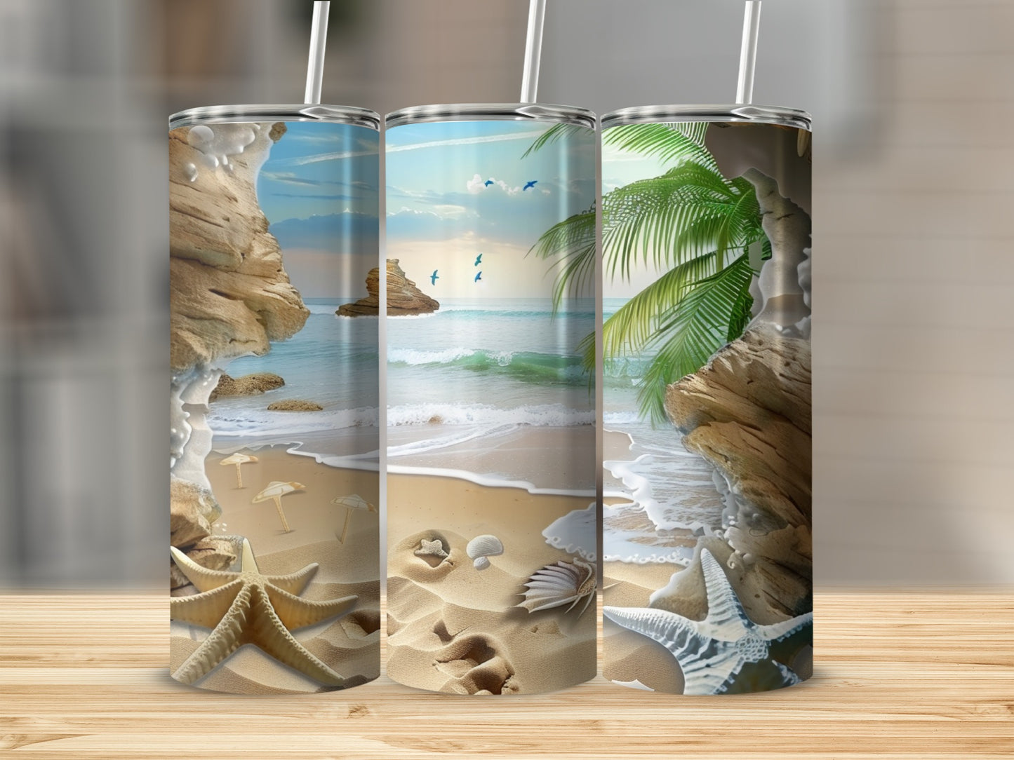 Beach scene with starfish and shells on sand, three tumblers displayed.