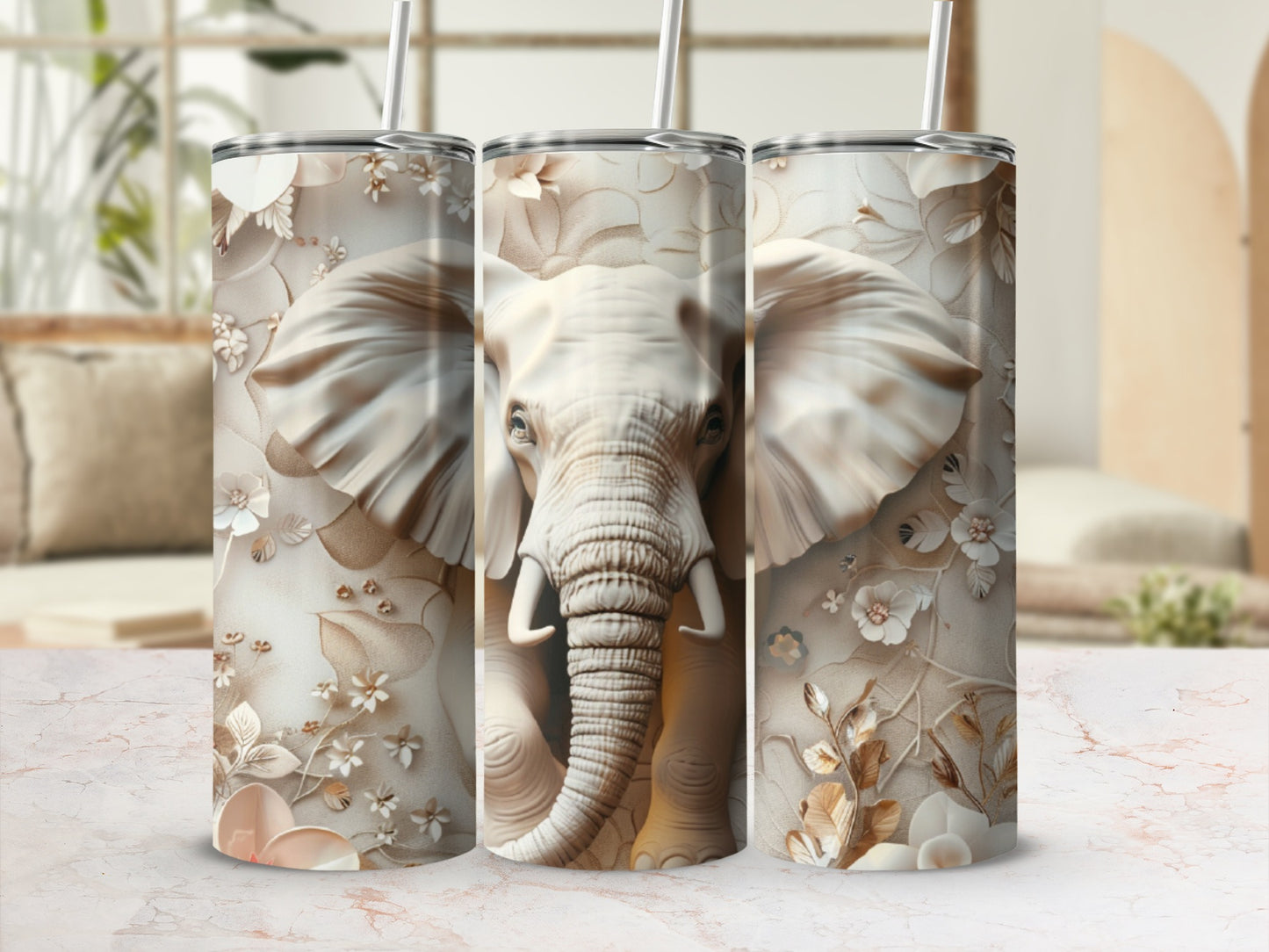 Close-up of an elephant's face with floral patterns on a tumbler.