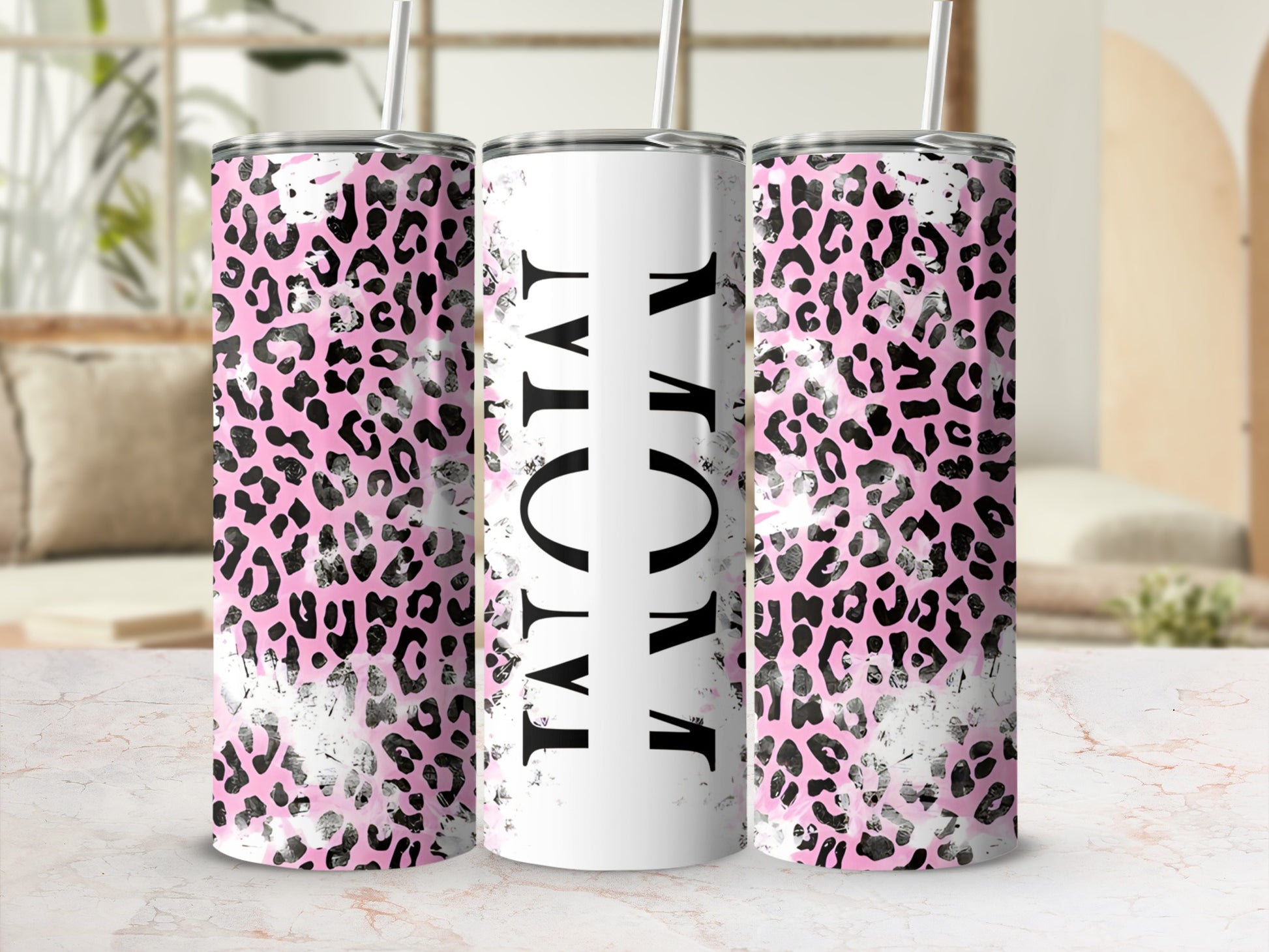 Pink leopard print tumbler with "MOM" in black letters.