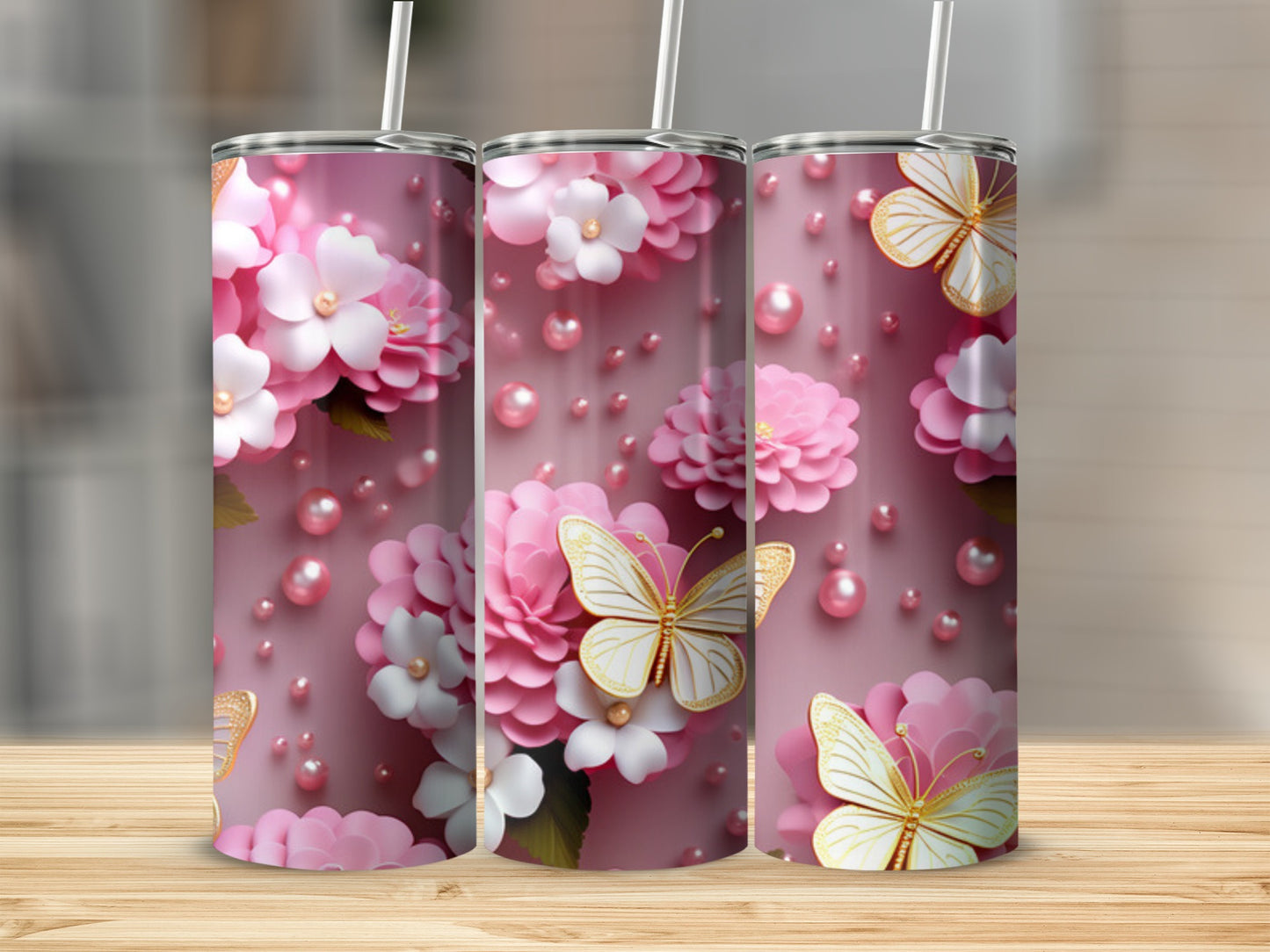Pink tumbler with white flowers, pink blossoms, and golden butterflies.