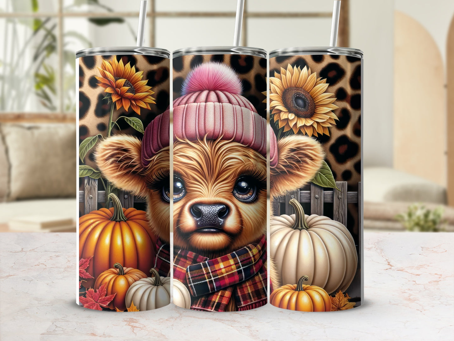 Cow wearing a beanie and scarf with pumpkins and sunflowers.