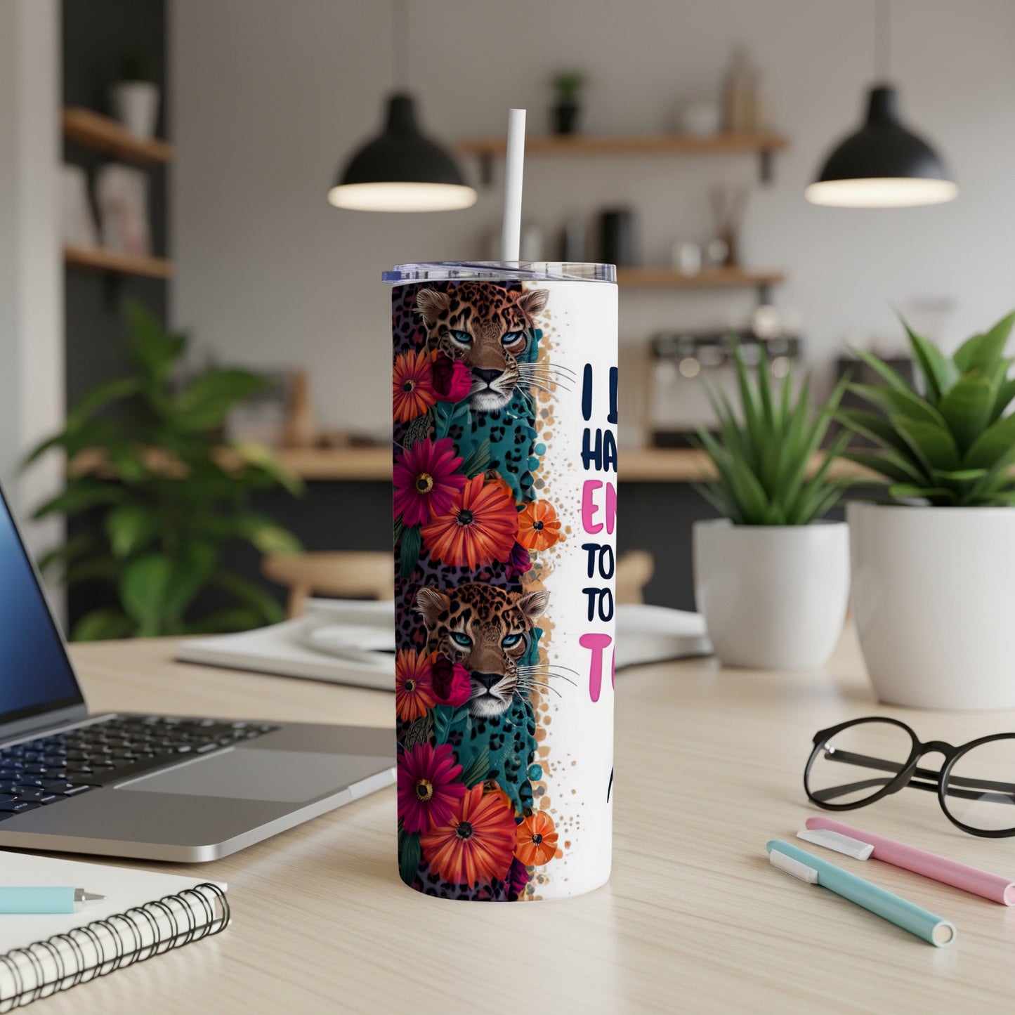 Tumbler with leopard print and colorful flowers, text reads "I have 99 problems but a…"