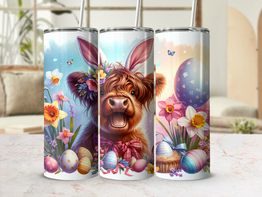 Easter Highland cow with bunny ears and colorful eggs on a tumbler.
