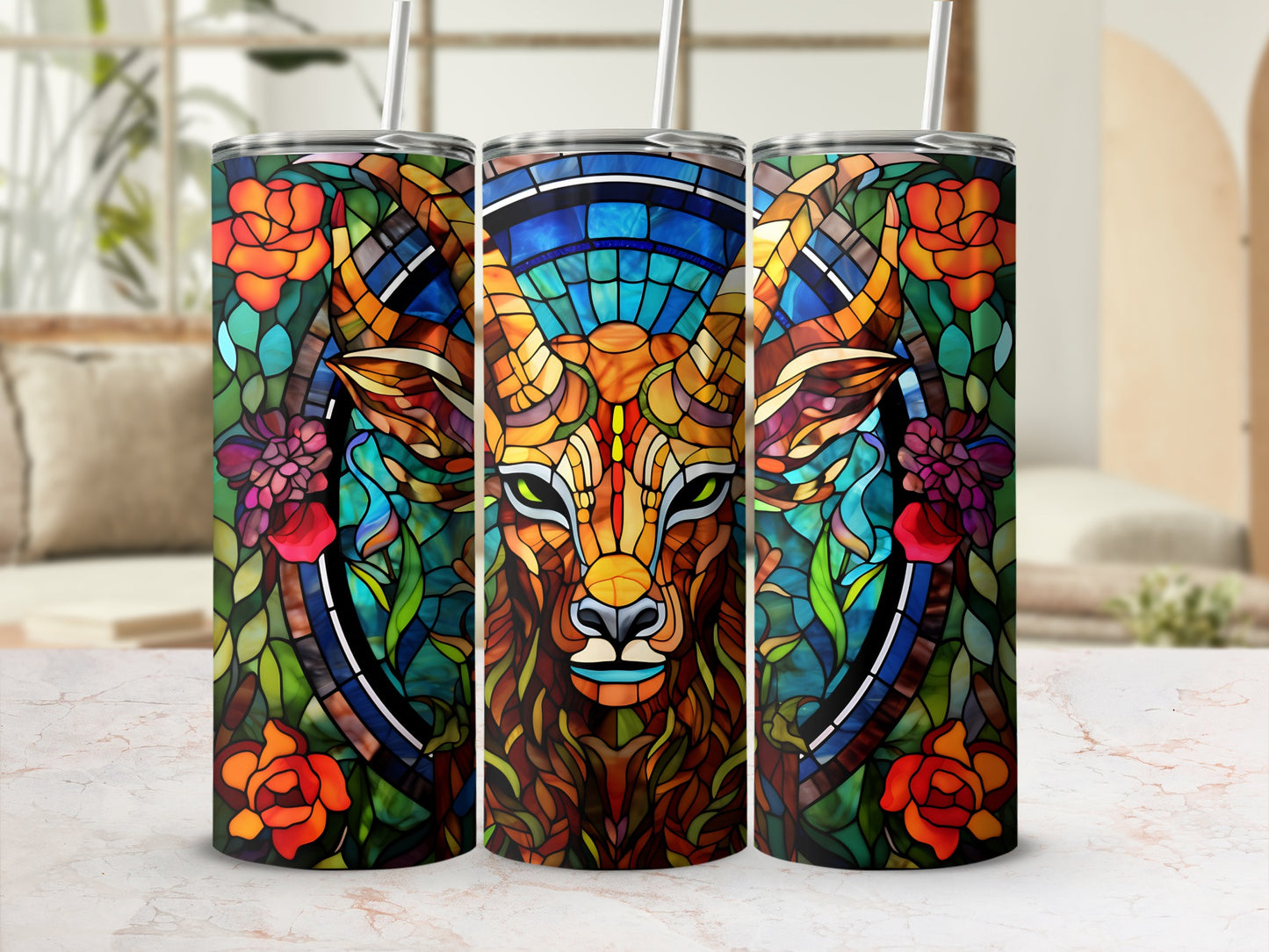 Stained glass deer head with floral accents on three tumblers.