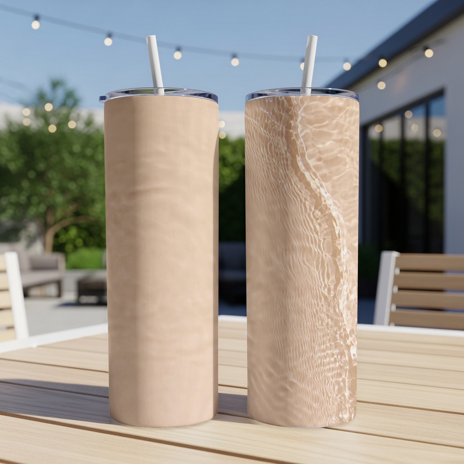 Two tall tumblers, one with a solid tan pattern, another with a water ripple pattern.
