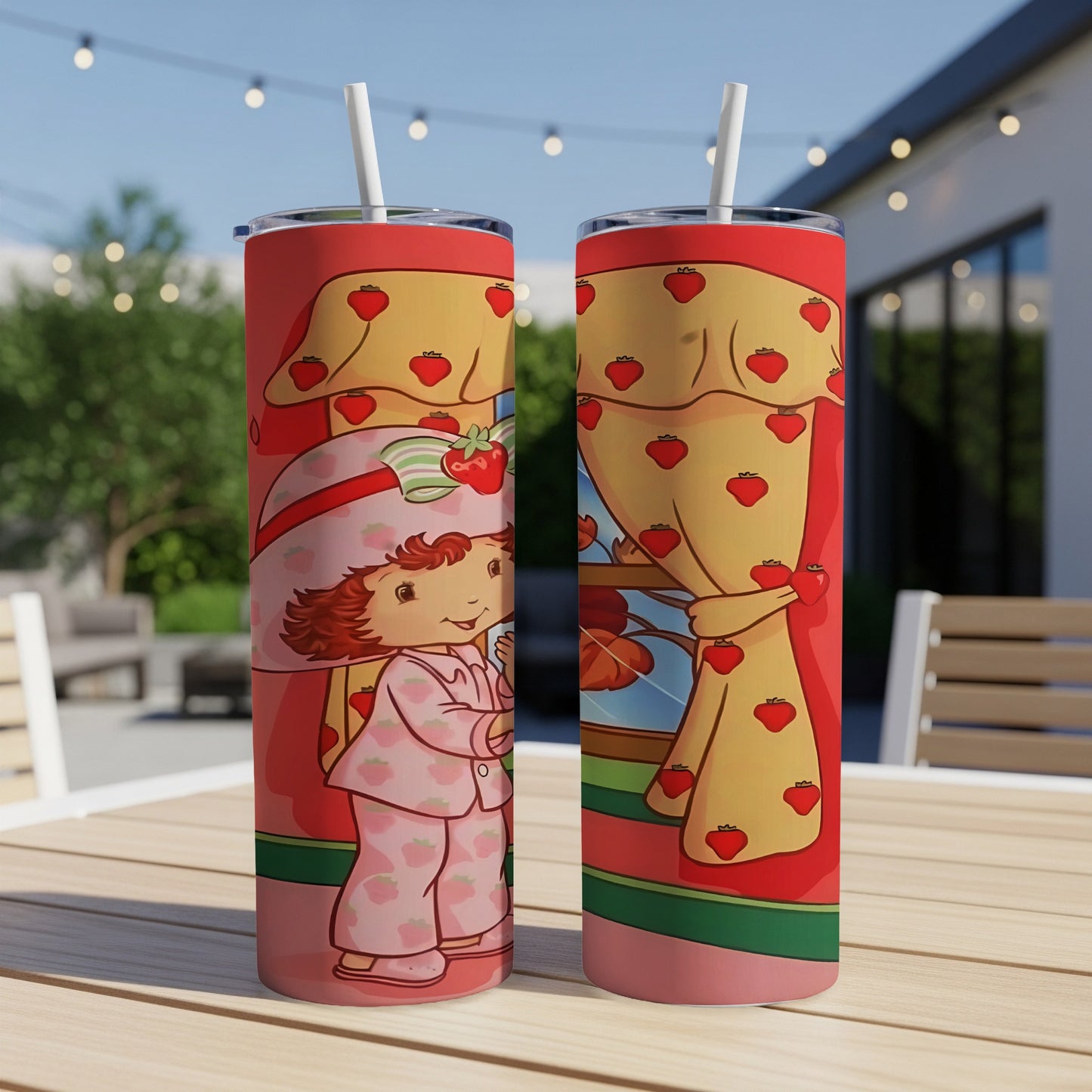 Strawberry Shortcake in pajamas with strawberry curtain pattern on tumblers.