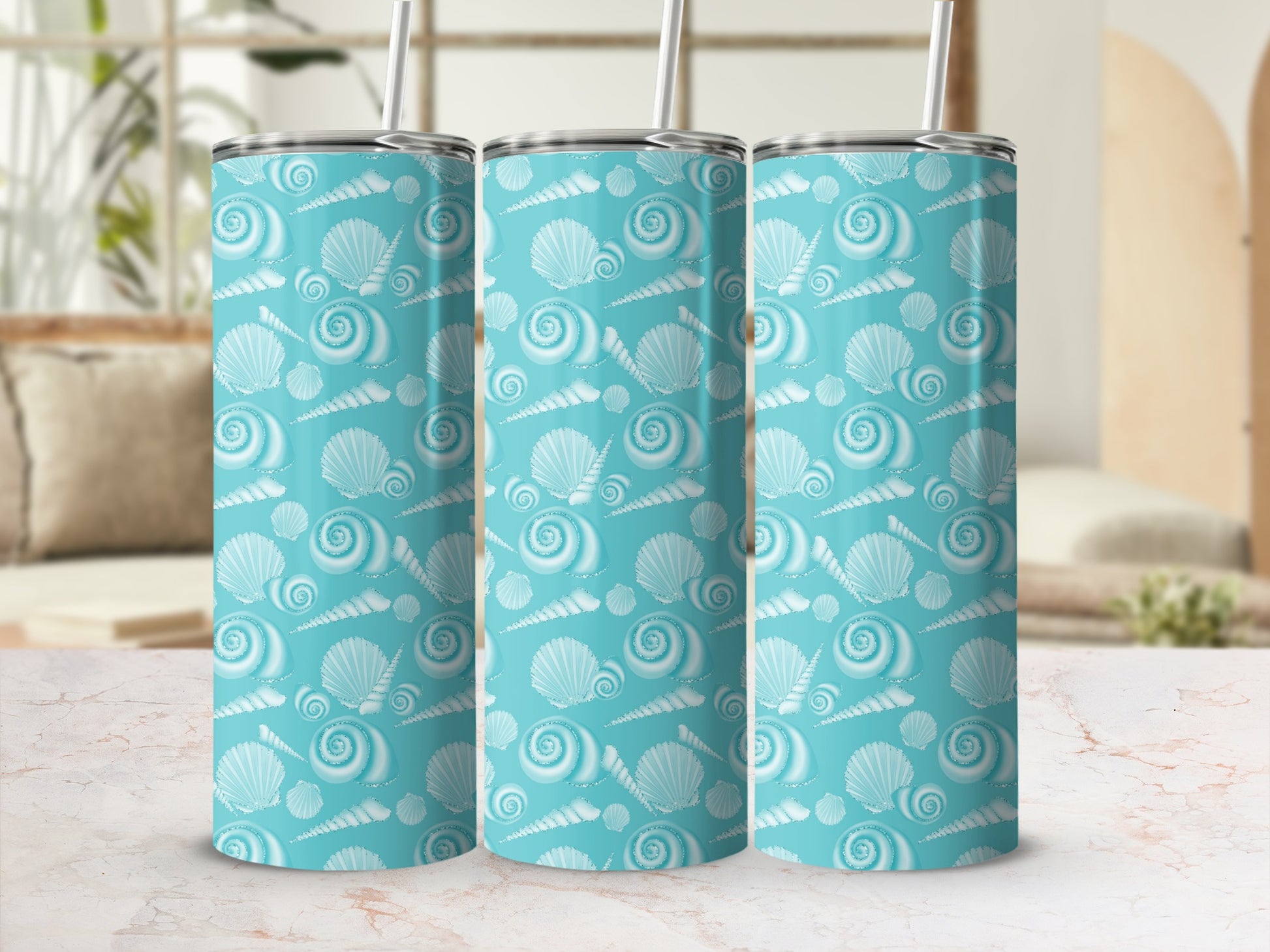 Three turquoise tumblers with a repeating pattern of white seashells.