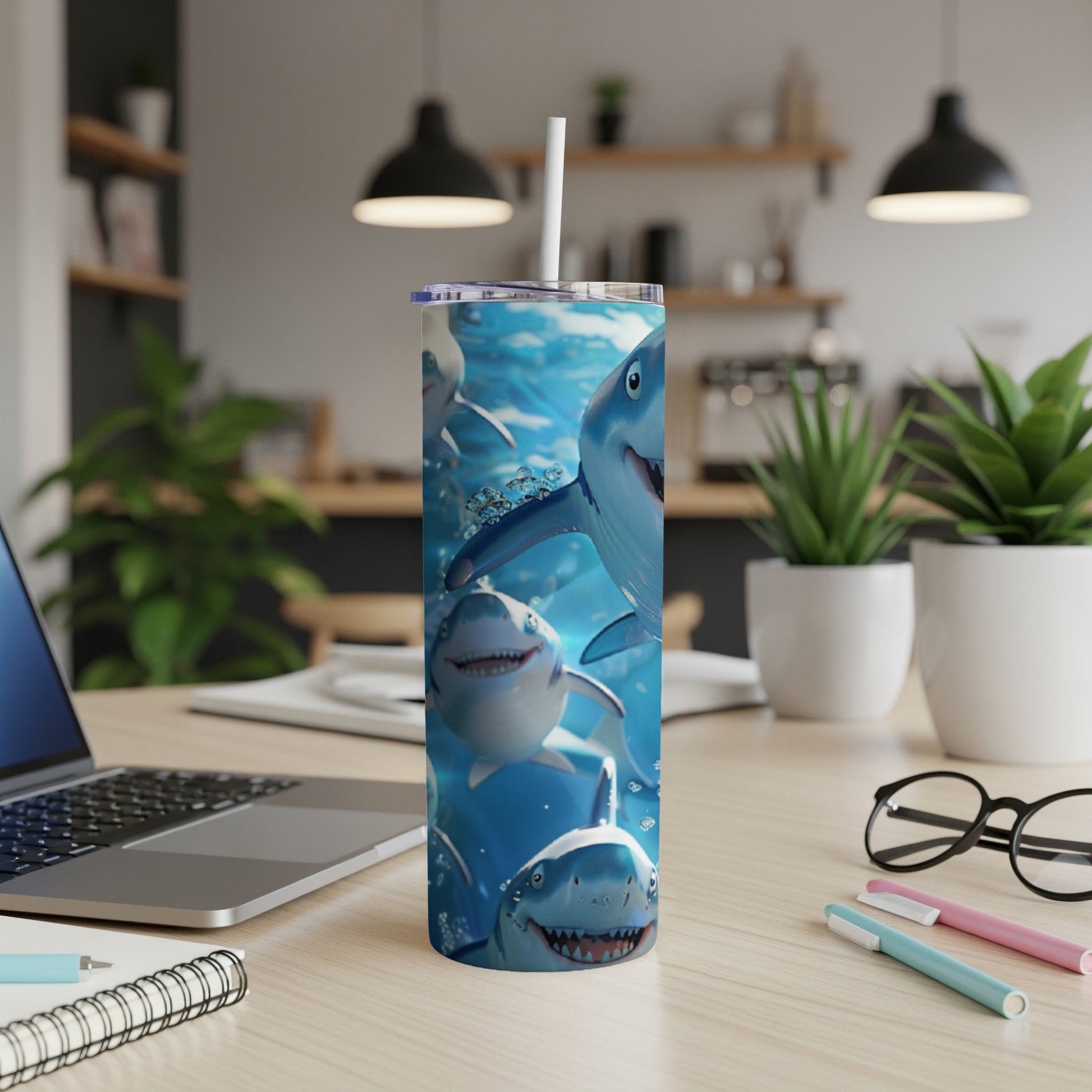 Smiling cartoon sharks swimming in water on a white tumbler.