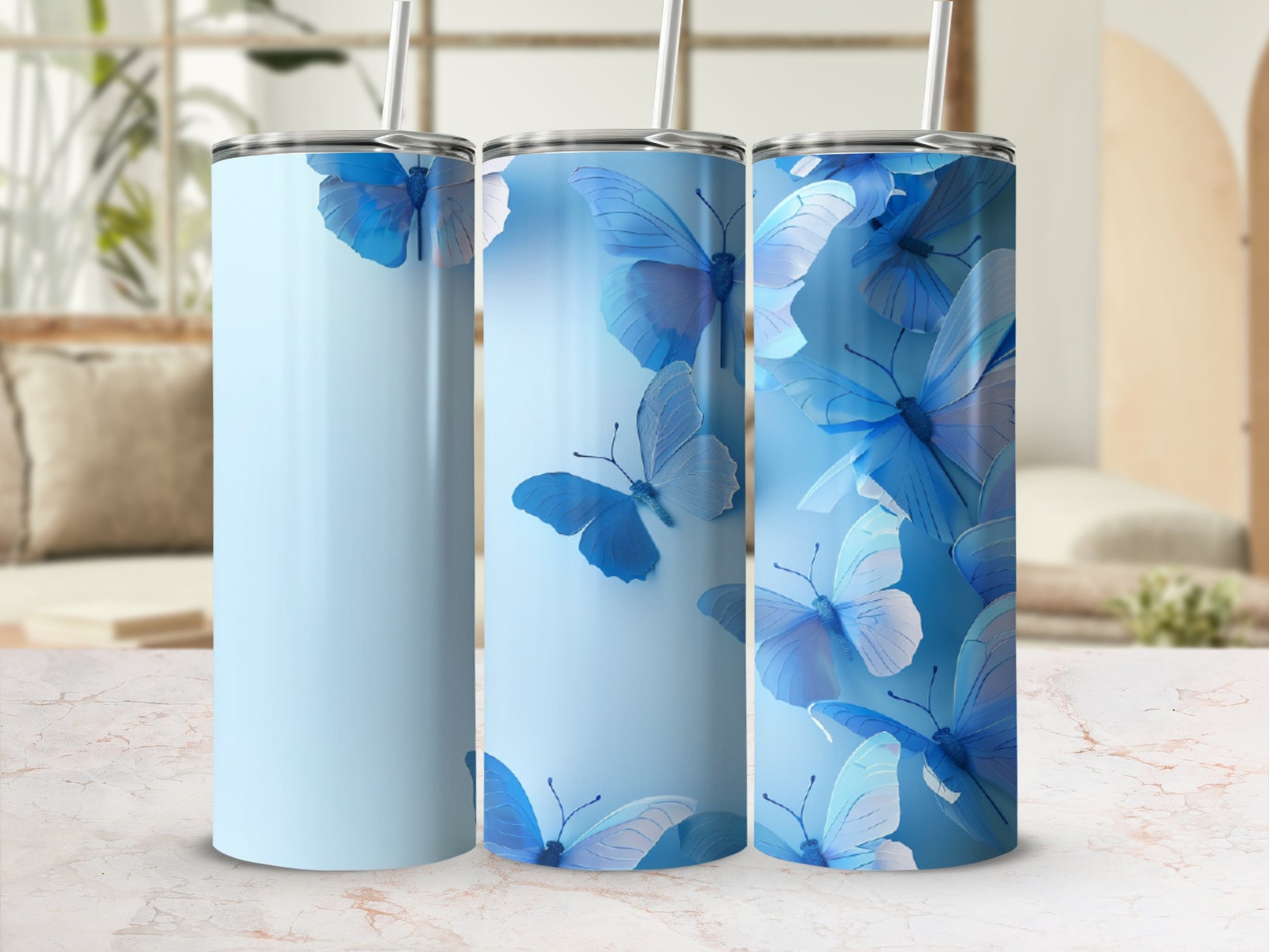 Light blue tumbler with delicate blue butterflies and white straws.