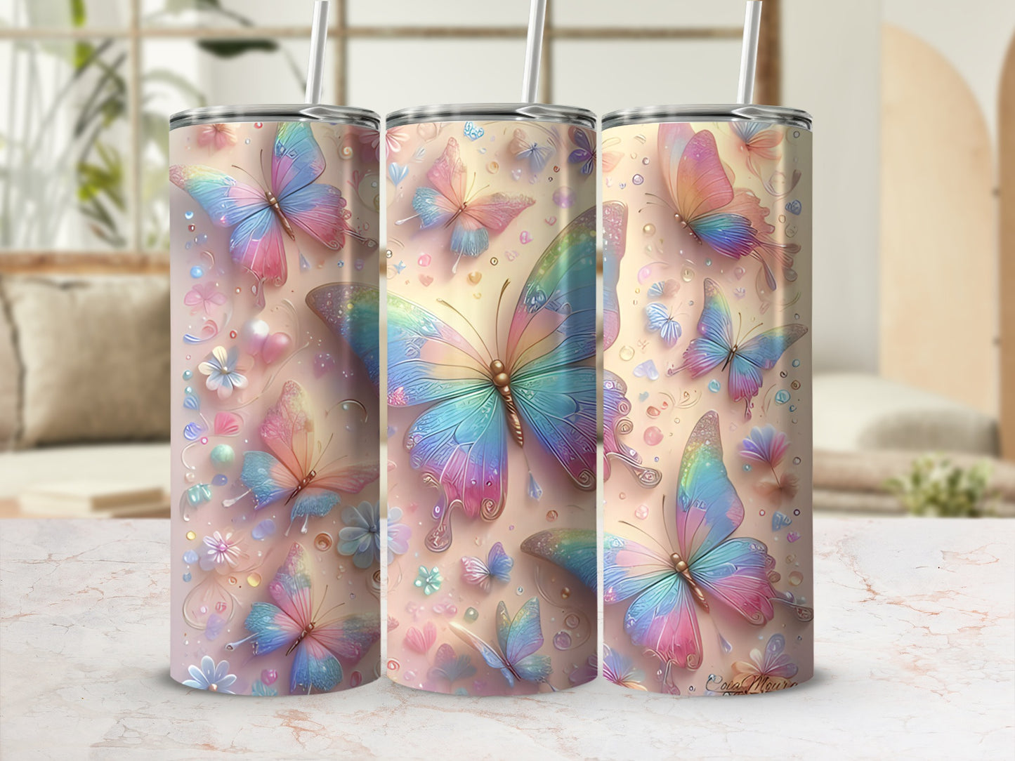 Pastel butterflies and flowers adorn a tapered tumbler with a straw.