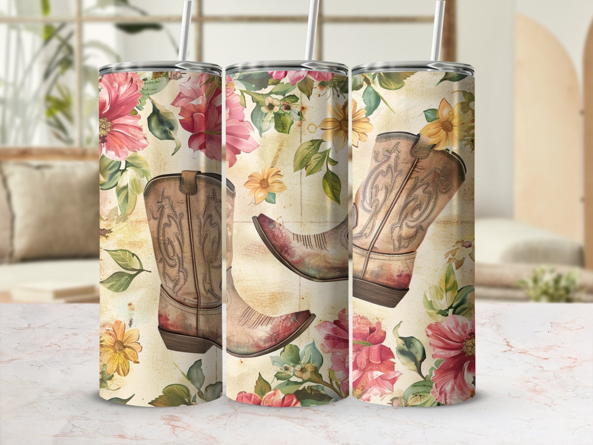 Floral cowboy boots on a tumbler with straw.
