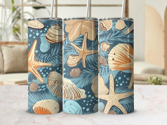 Three tumblers with seashells and palm leaves pattern.