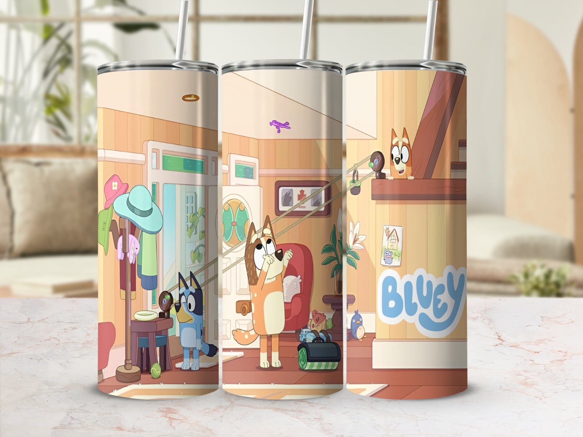 Bluey and Bingo characters on a colorful tumbler with indoor scene background.