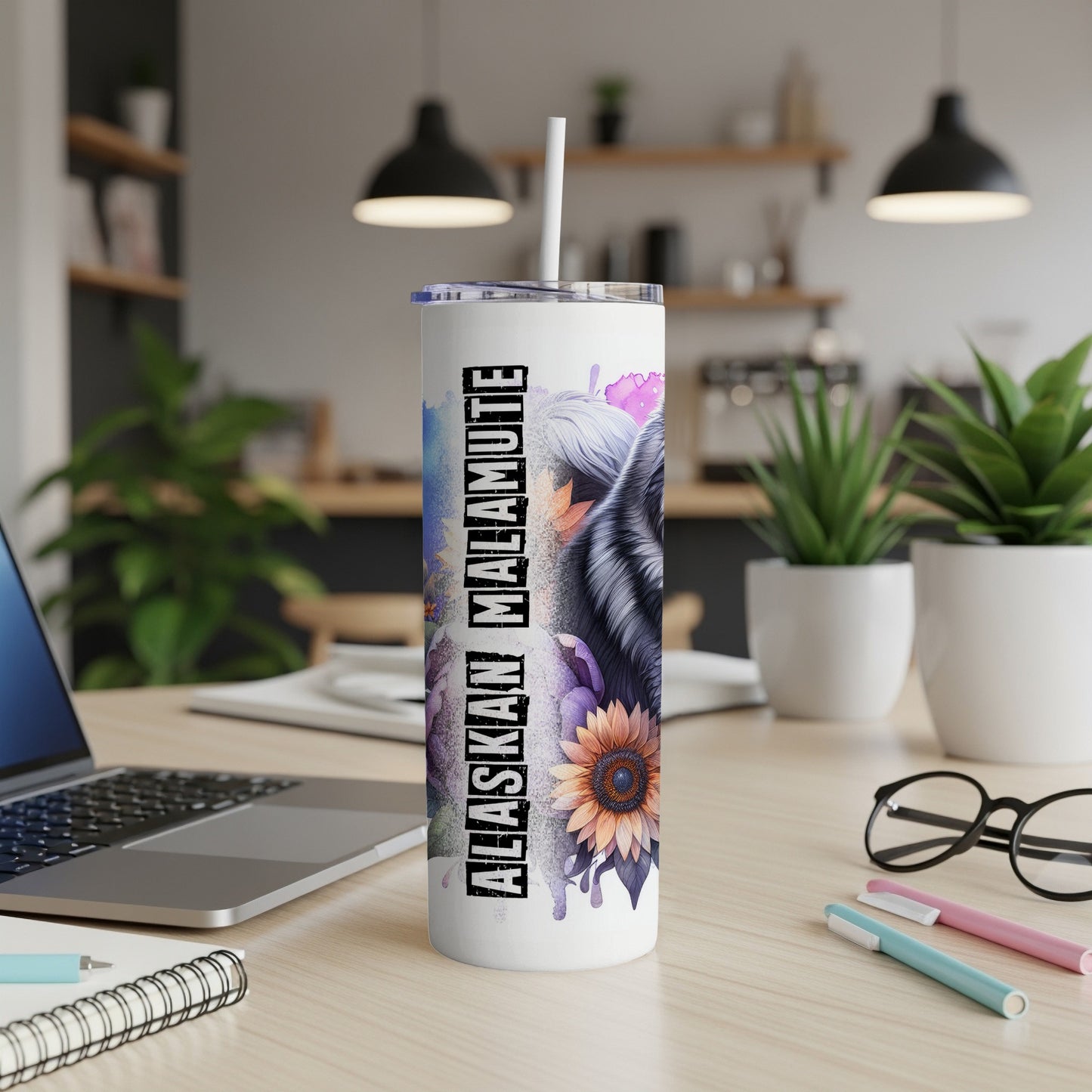 Alaskan Malamute tumbler with floral accents and straw.