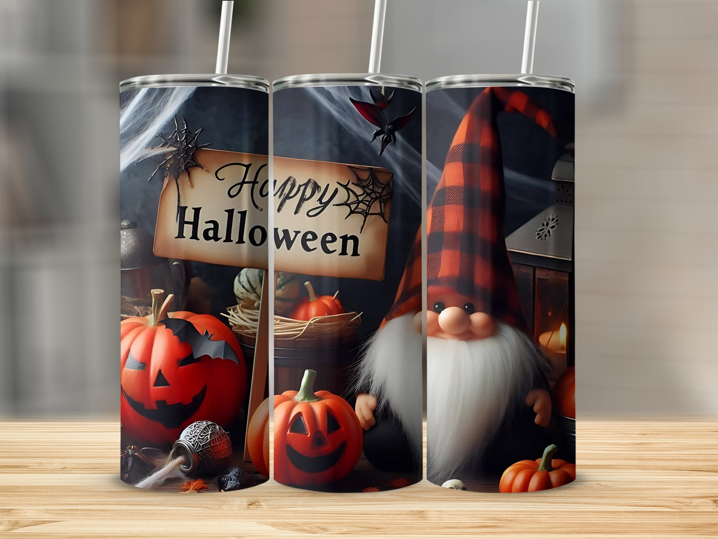 Halloween tumblers with pumpkins, a gnome, and a "Happy Halloween" sign.