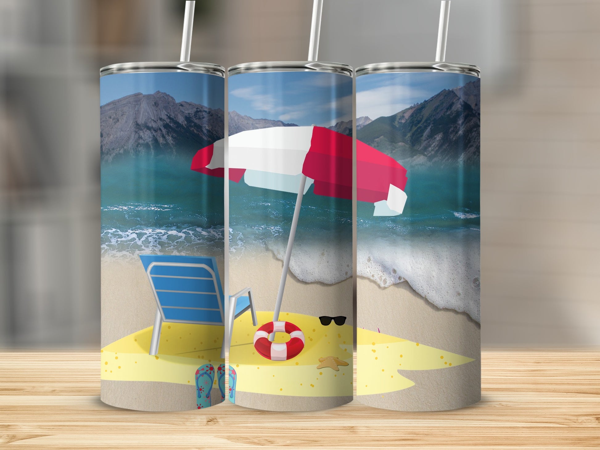 Three beach-themed tumblers with ocean, sand, chair, and umbrella designs.