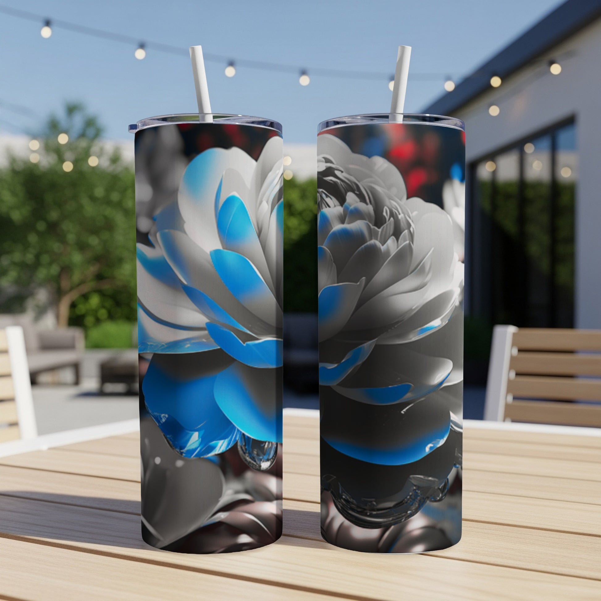 Two tumblers with blue and white floral design and dew drops.