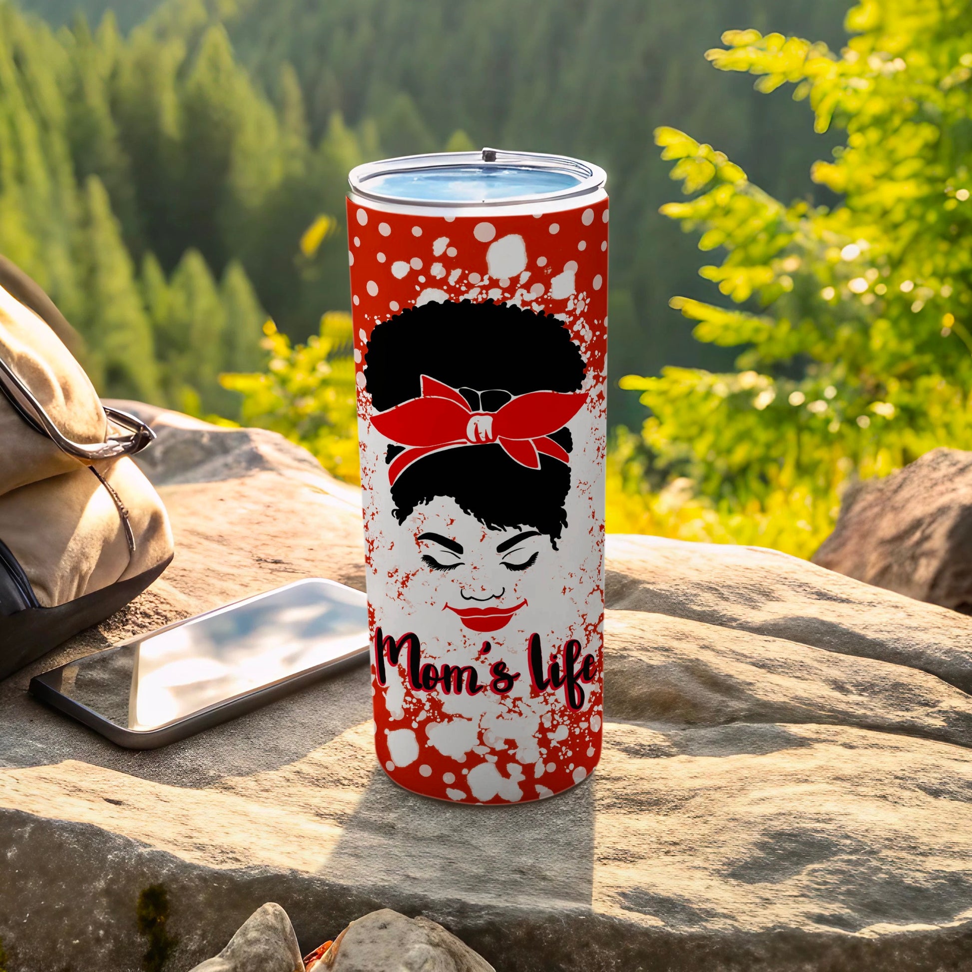 Red polka dot tumbler with "Mom's life" text and woman's silhouette.