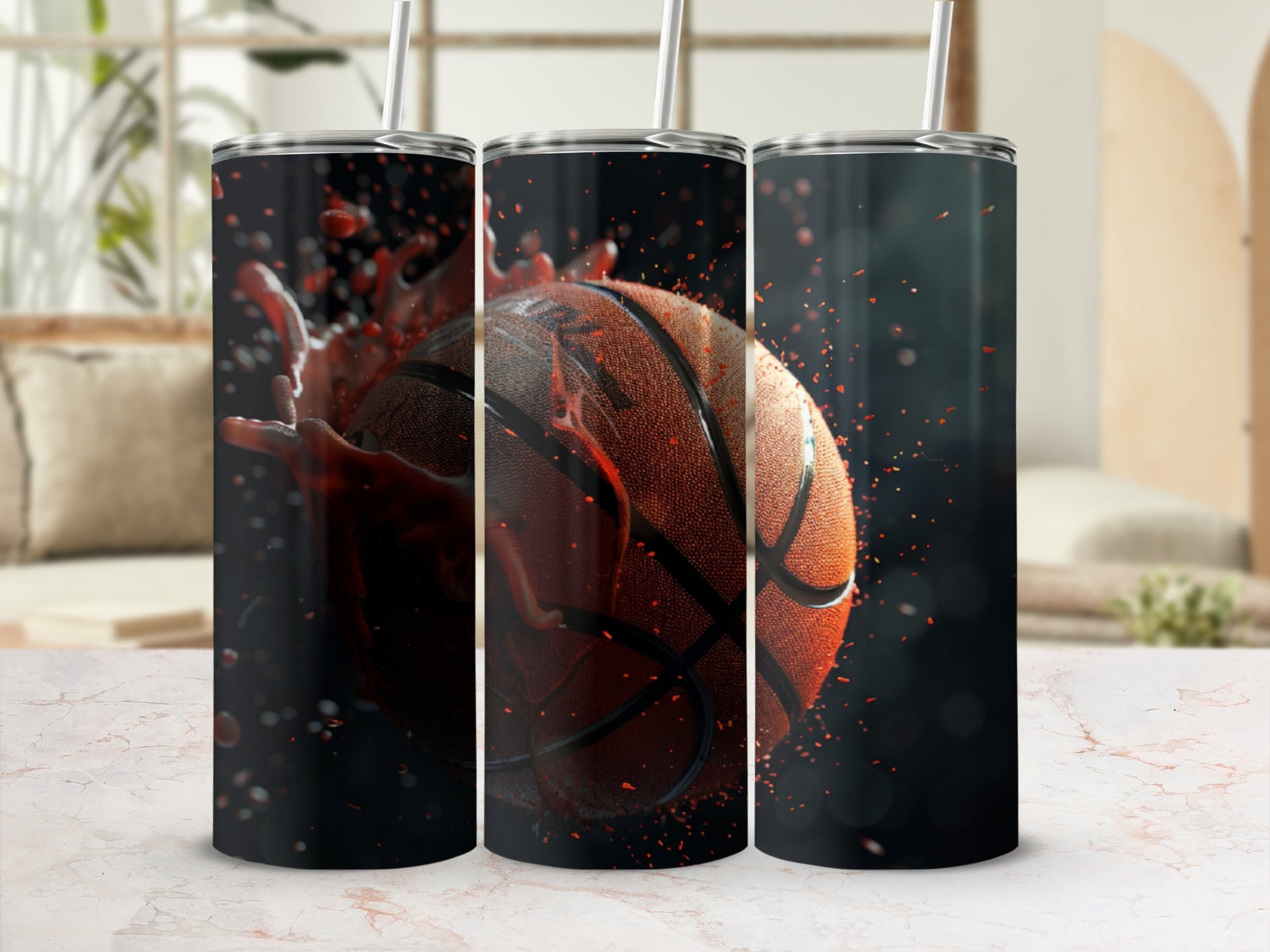 Three tumblers with a basketball splashing liquid design.