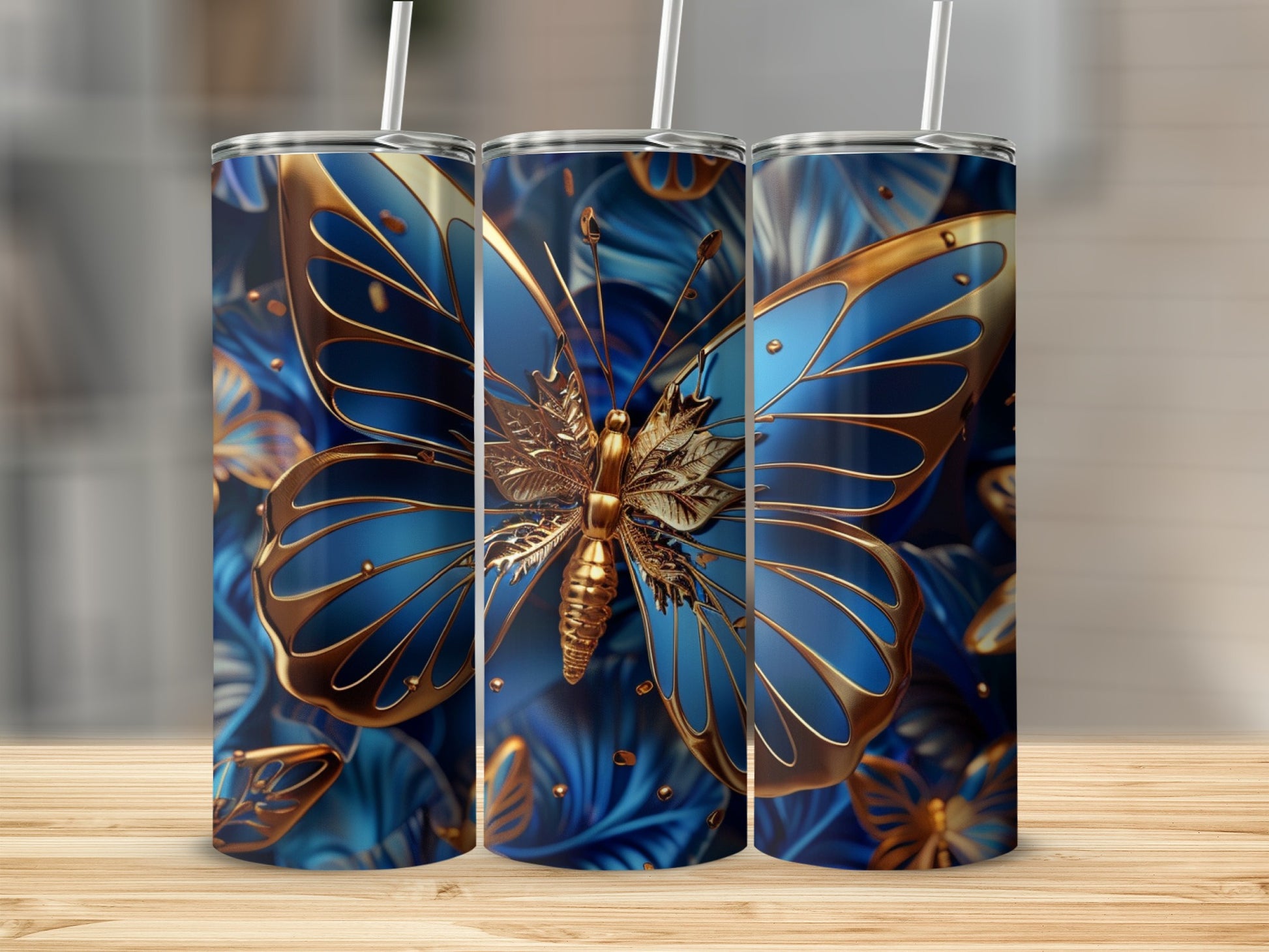 Blue butterfly tumbler with gold accents on wooden surface.