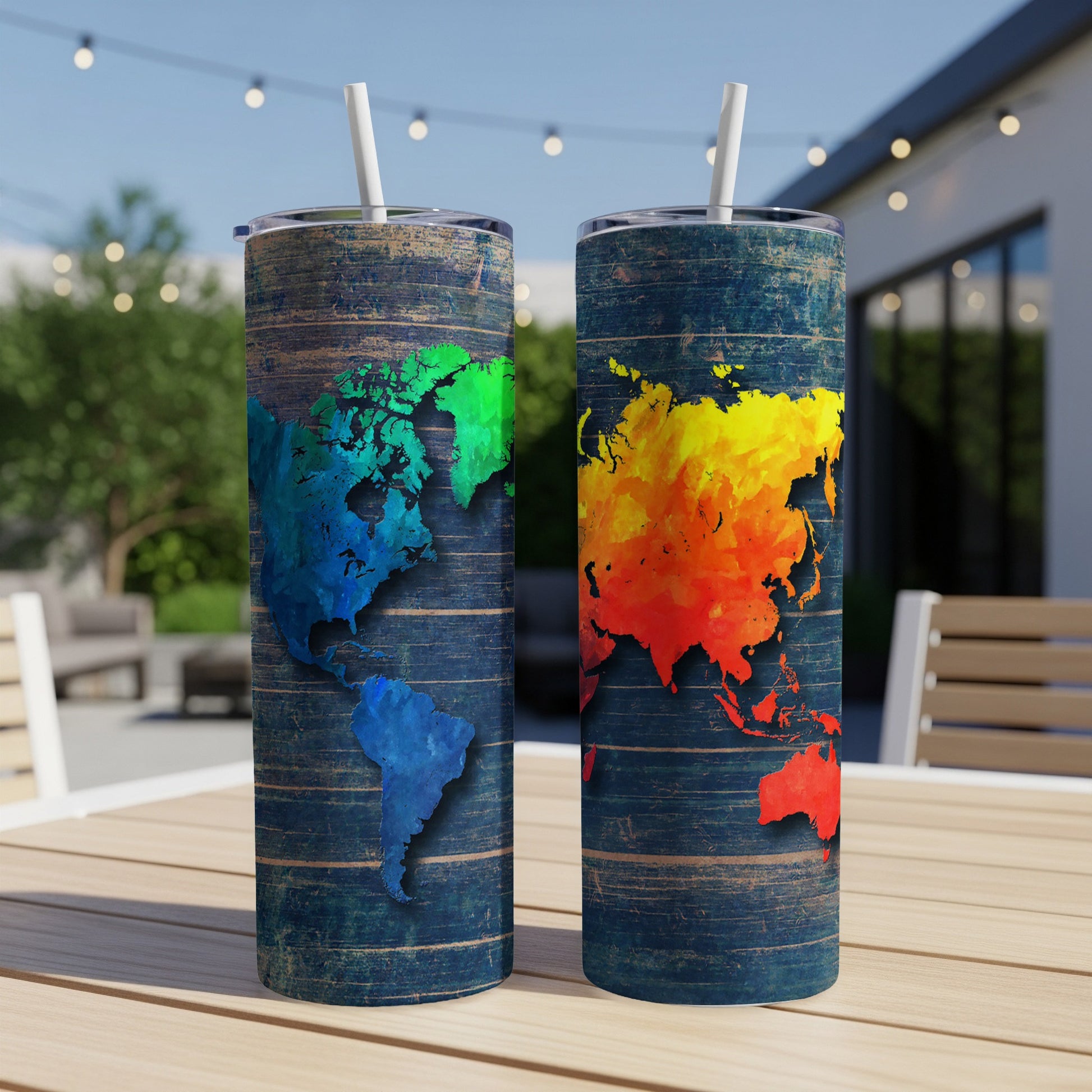 Two tumblers with a map design in blue, green, yellow, orange, and red.