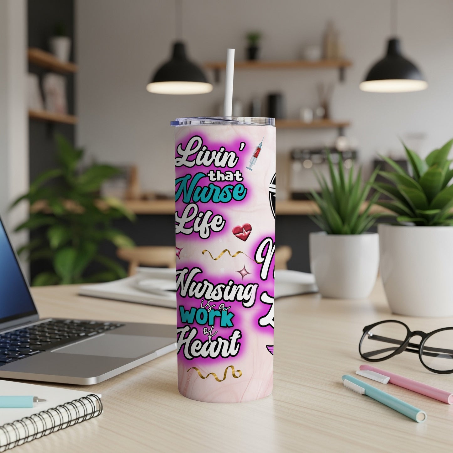Pink tumbler with "Livin' that Nurse Life" text and a syringe.