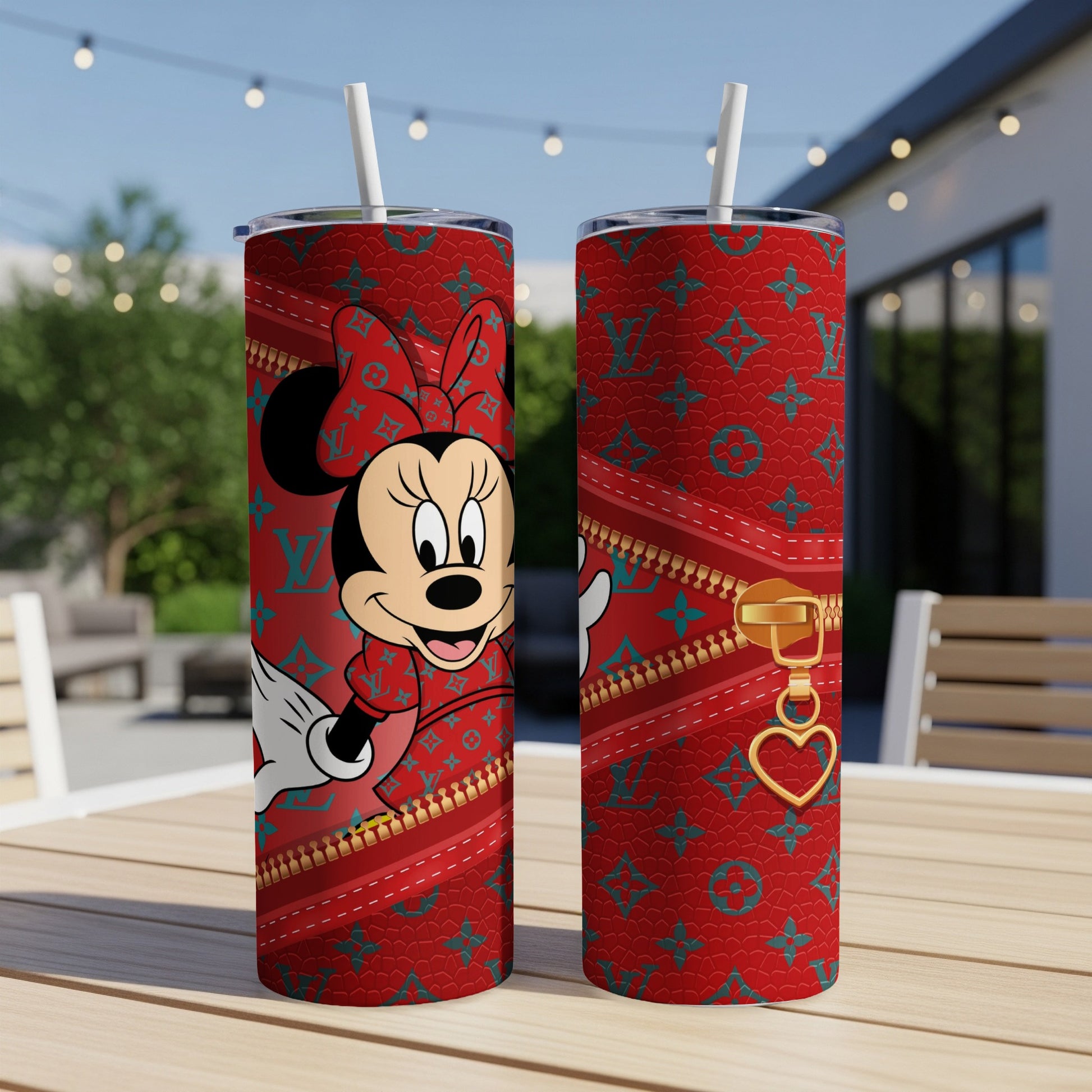 Minnie Mouse on a red patterned tumbler with a zipper design.