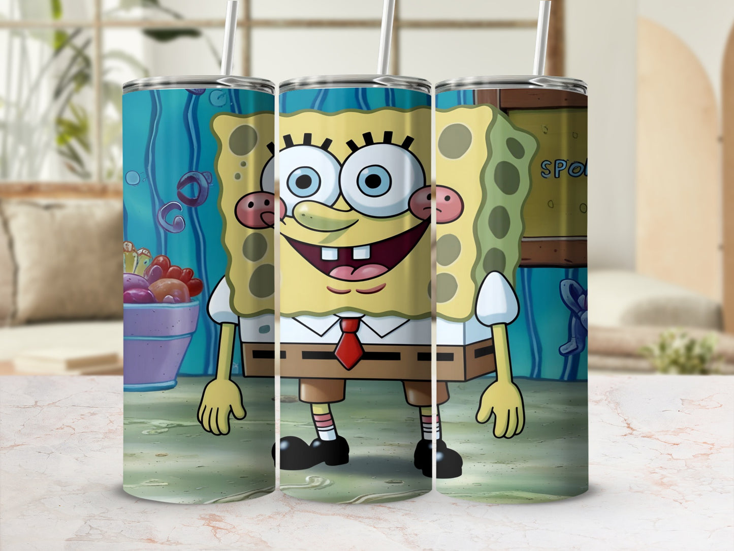 SpongeBob SquarePants character on a patterned tumbler with a straw.