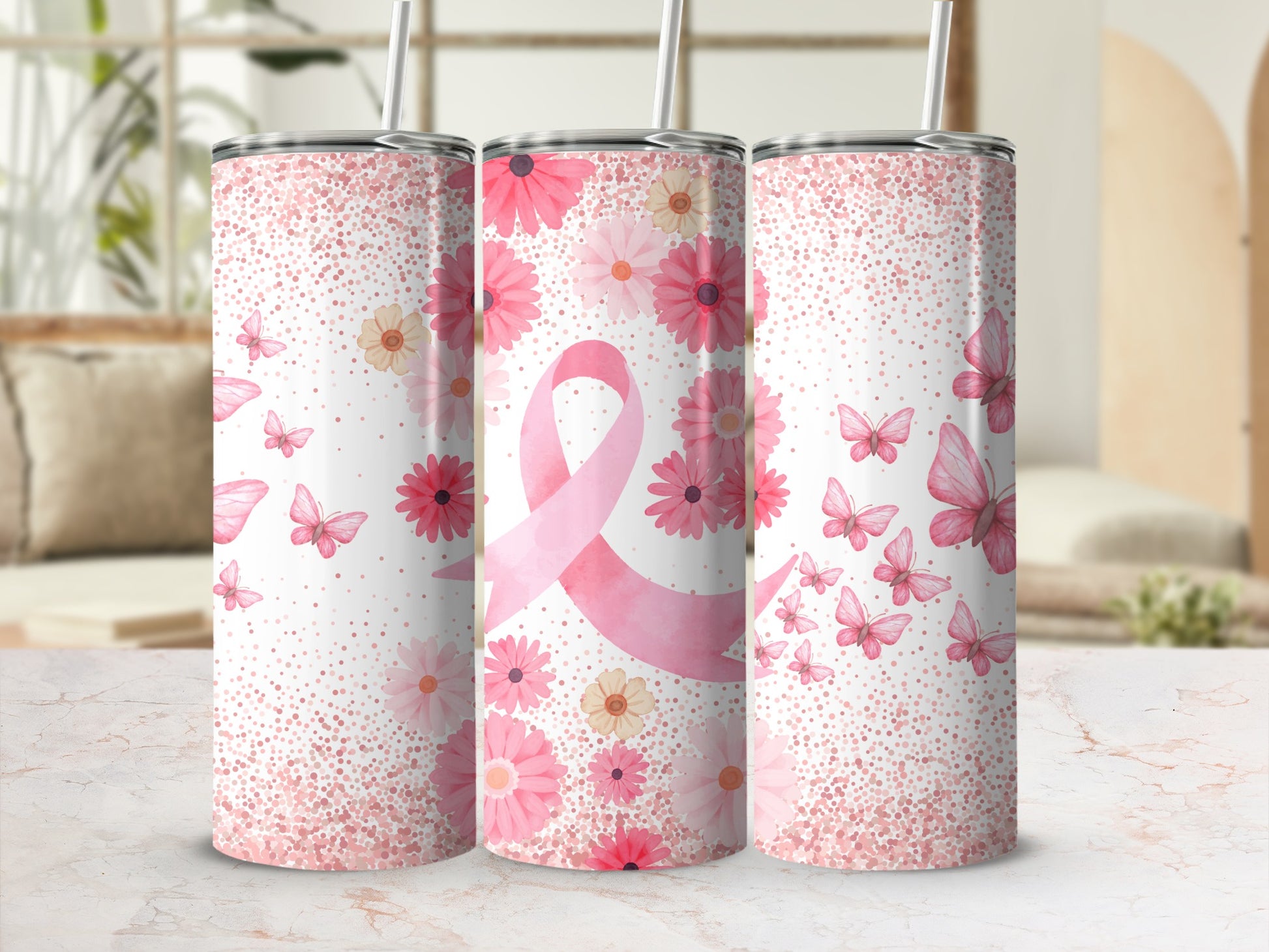Pink floral breast cancer awareness tumbler with butterflies and glitter.