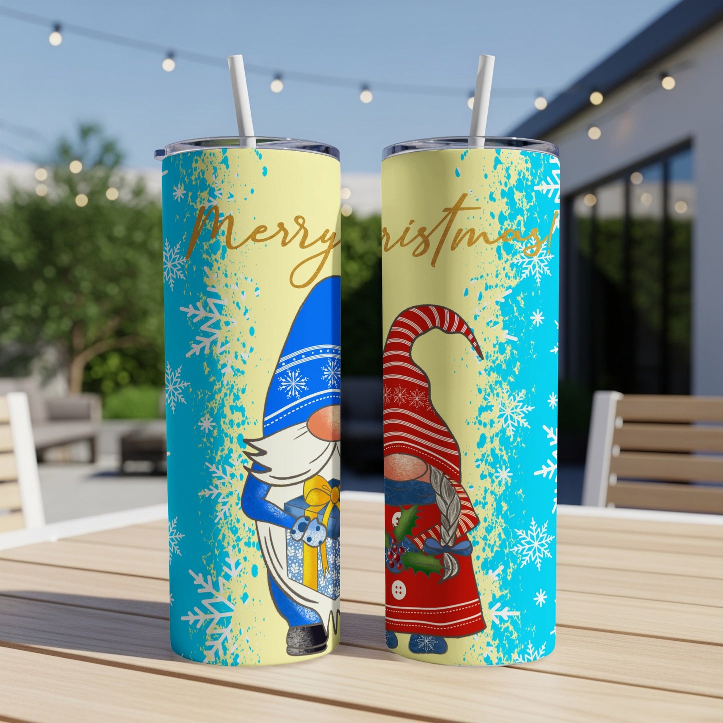 Two gnomes, one blue, one red, with "Merry Christmas" text on a patterned background.