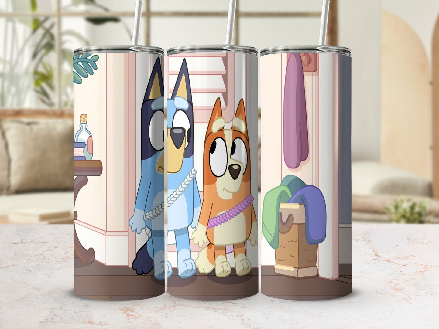 Bluey and Bingo characters on a patterned tumbler with a laundry basket backdrop.
