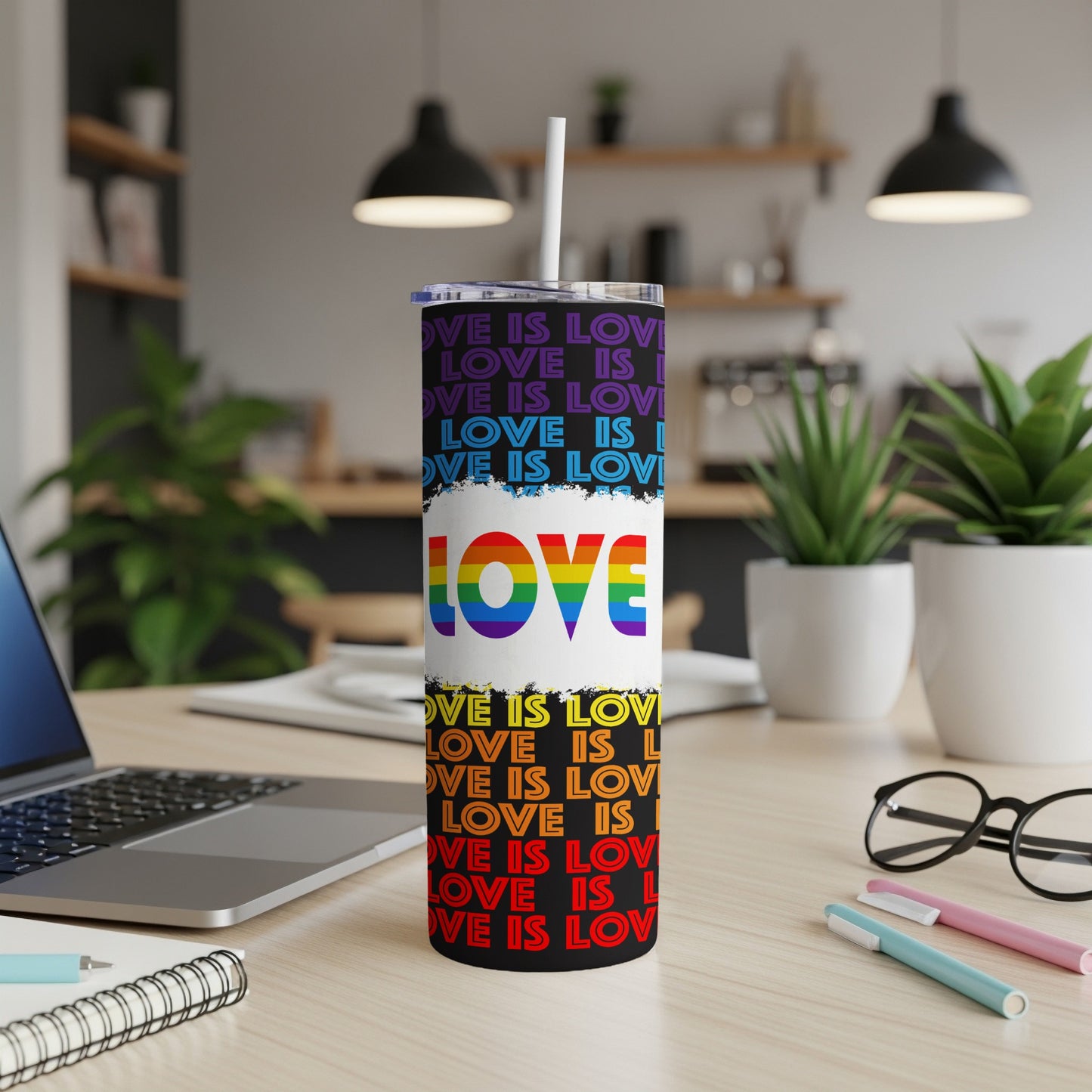 Tumbler with "LOVE IS LOVE" text in rainbow gradient and repeating text.