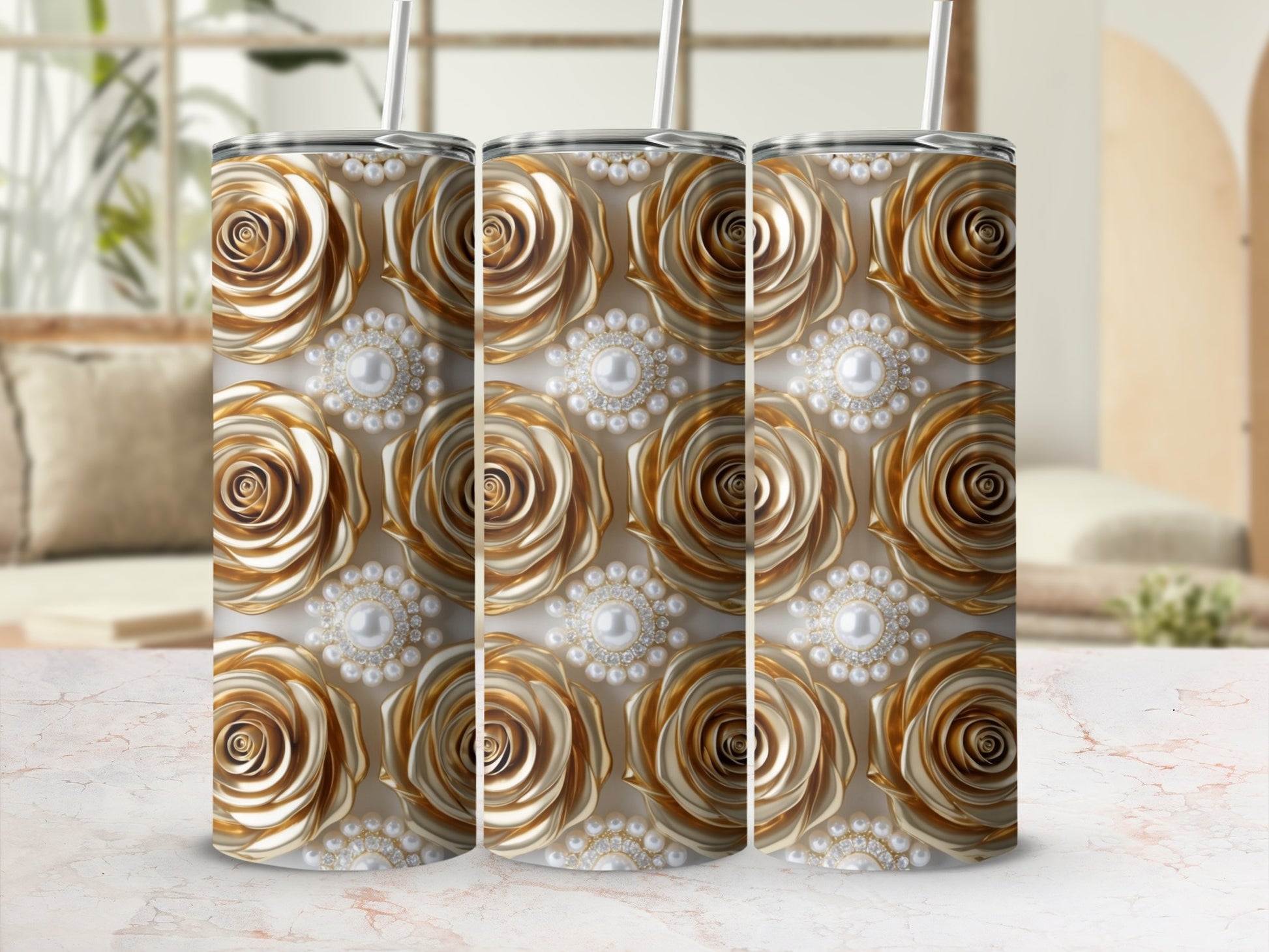 Gold rose and pearl pattern on three tumblers.