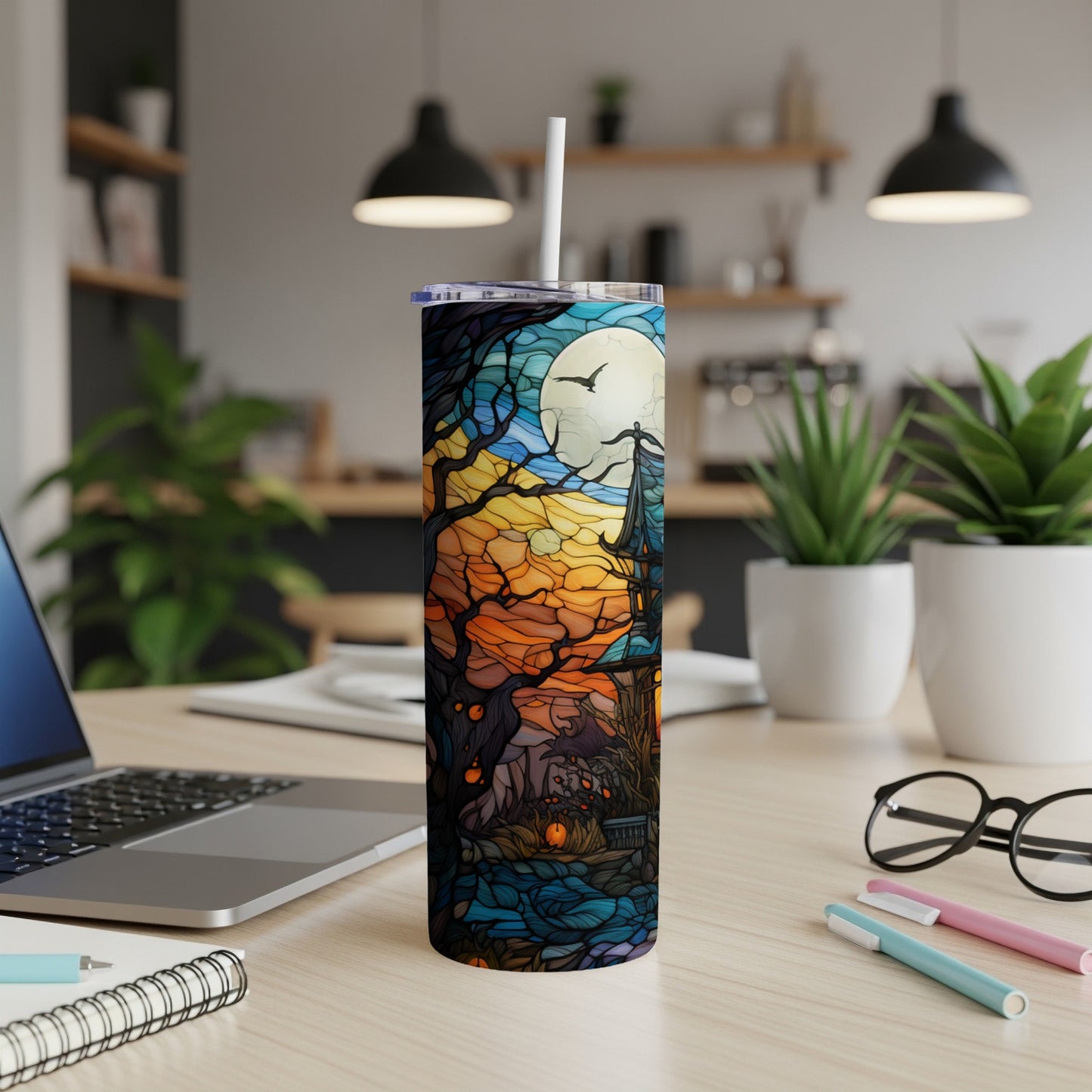Tall tumbler with a stained-glass Halloween scene, featuring a moonlit castle and pumpkins.