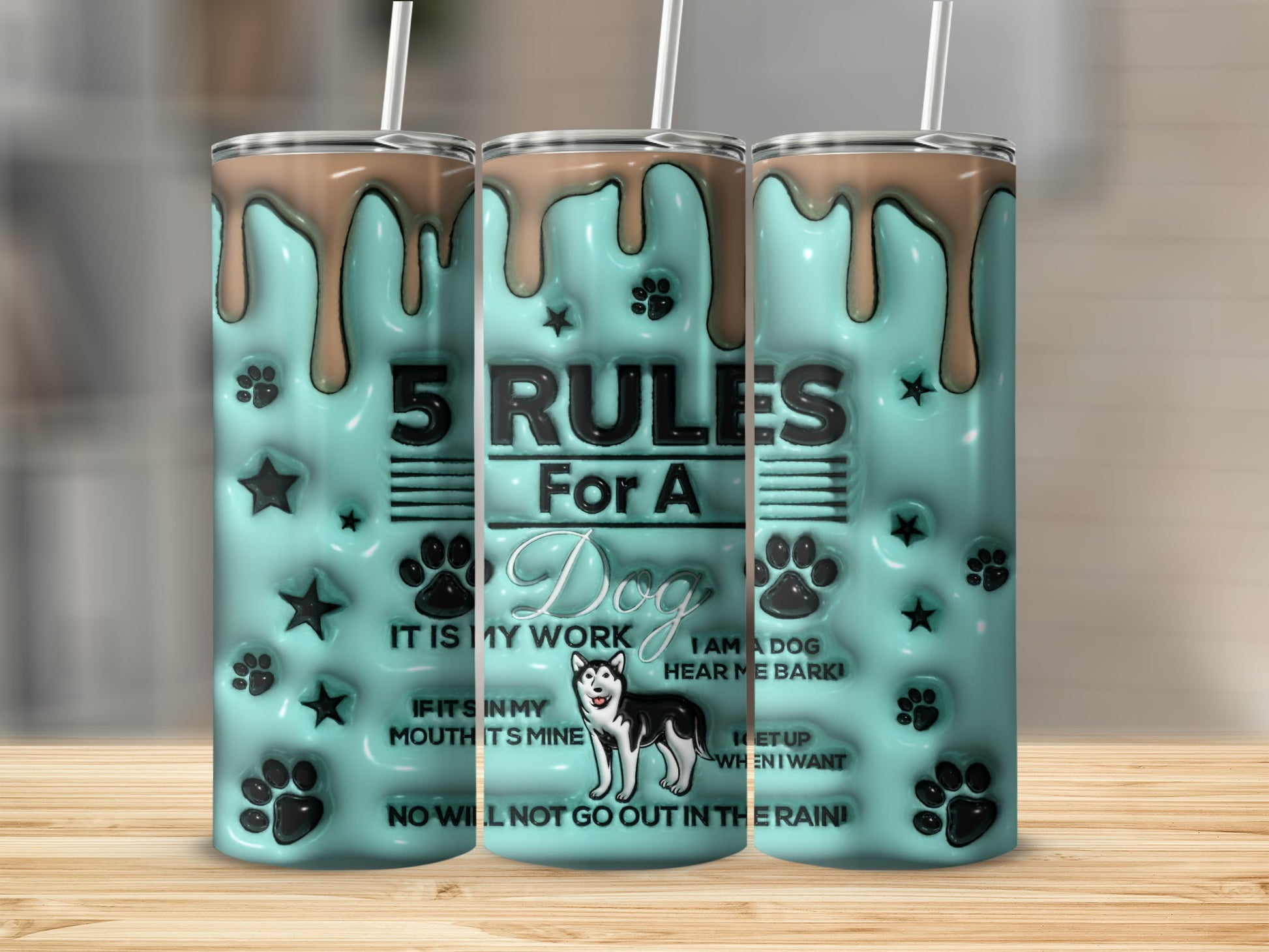 Tumbler with "5 Rules for a Dog" text and paw prints.