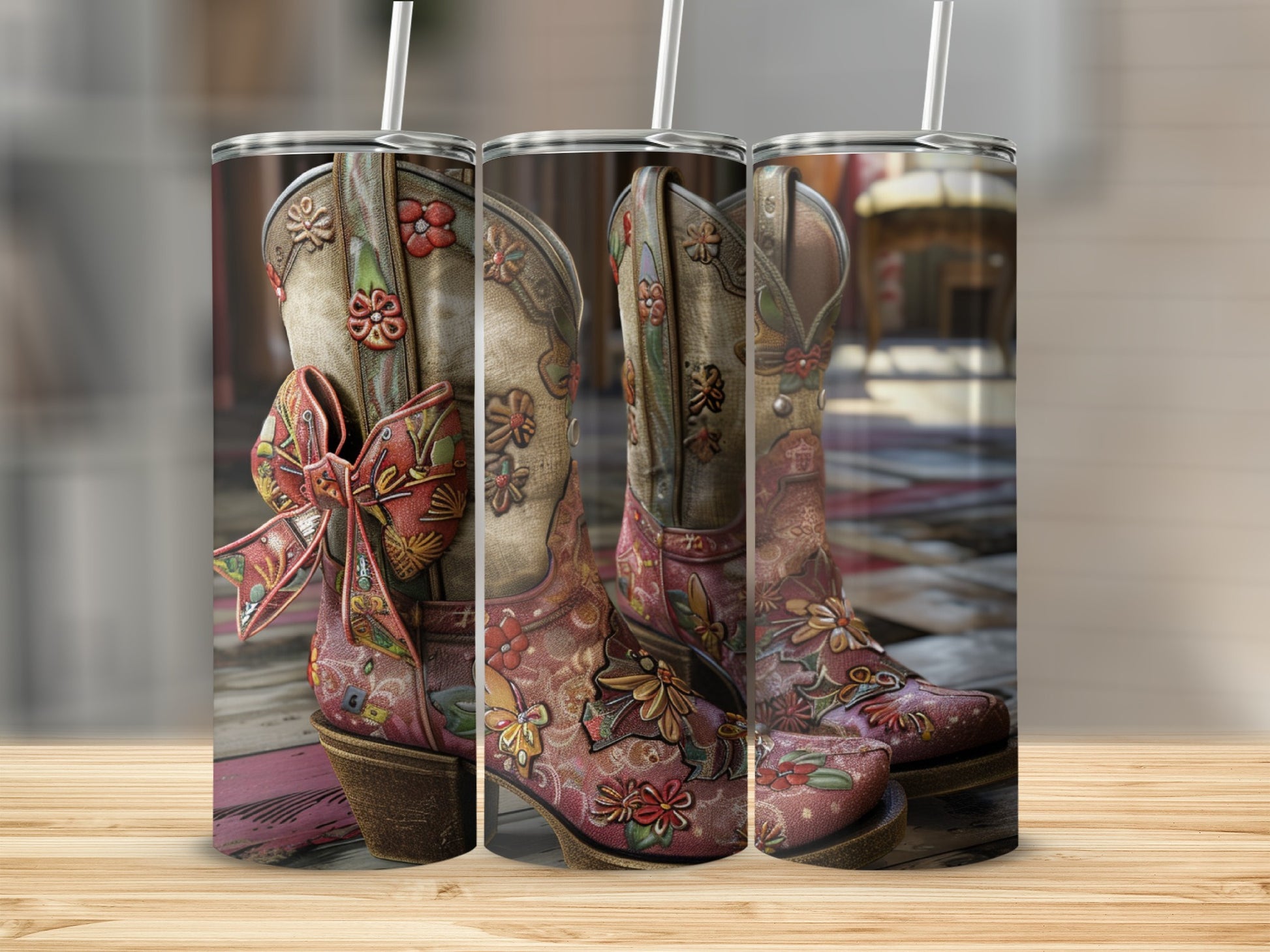 Embroidered cowboy boots with bows, on a wooden surface.