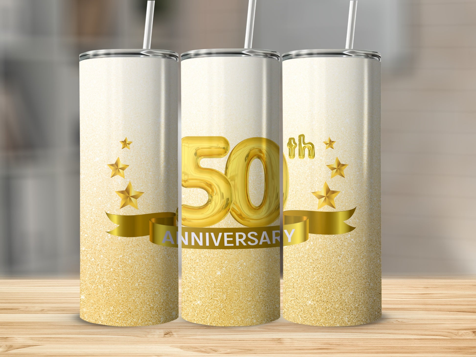 Gold 50th anniversary tumbler with stars and ribbon.