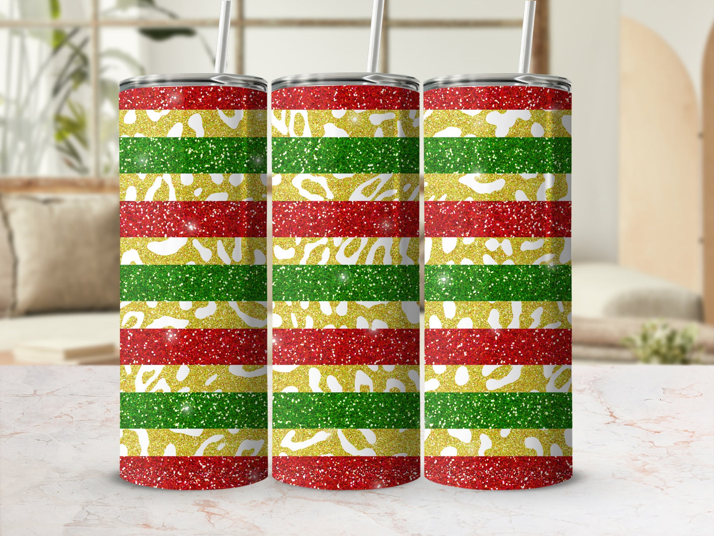 Three glitter tumblers with red, green, and gold stripes.